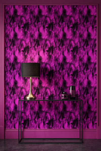 Sweeping fuchsia and purple feather wallpaper on an accent wall.