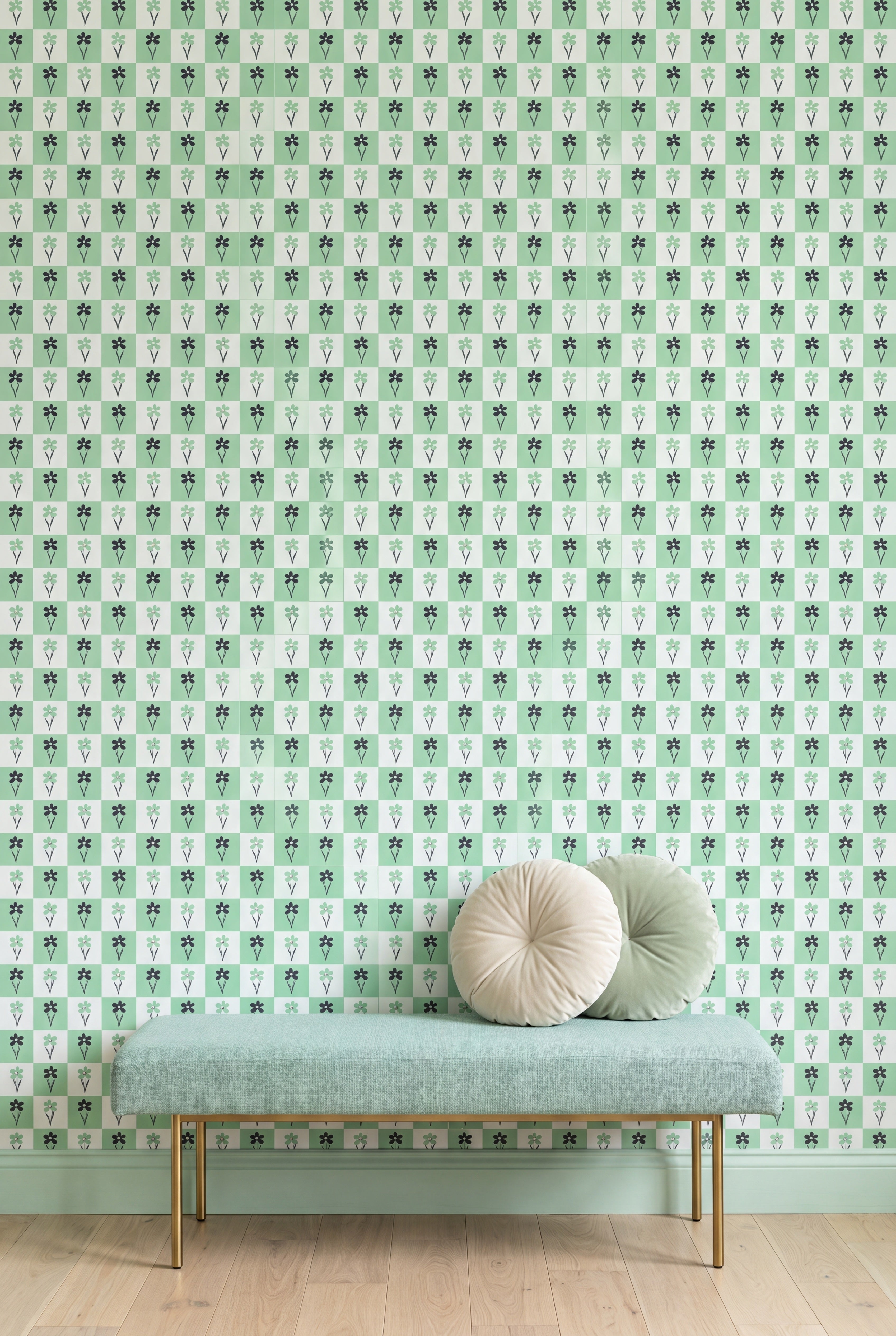 Black and green flowers on a mint checkerboard wallpaper on an accent wall.