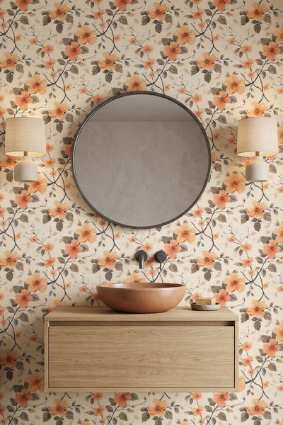 Peach and beige watercolor cherry blossoms on neutral wallpaper in a powder room.