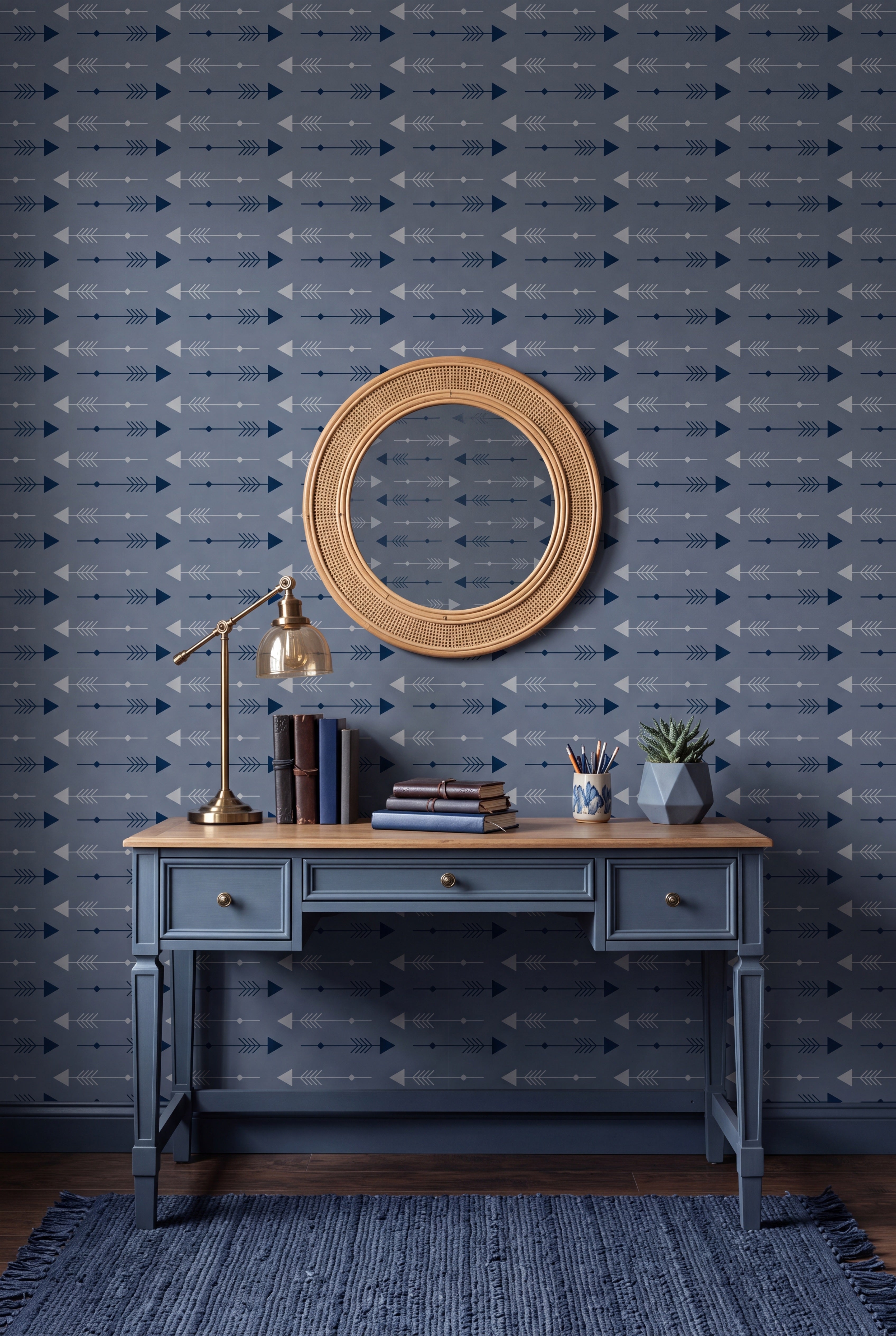 Navy and gray arrows on a sleek gray geometric wallpaper in a home office.