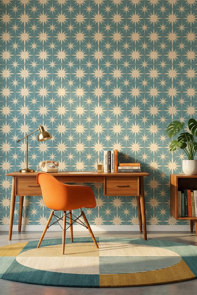 Retro teal and cream starbursts on a midcentury wallpaper in a home office.