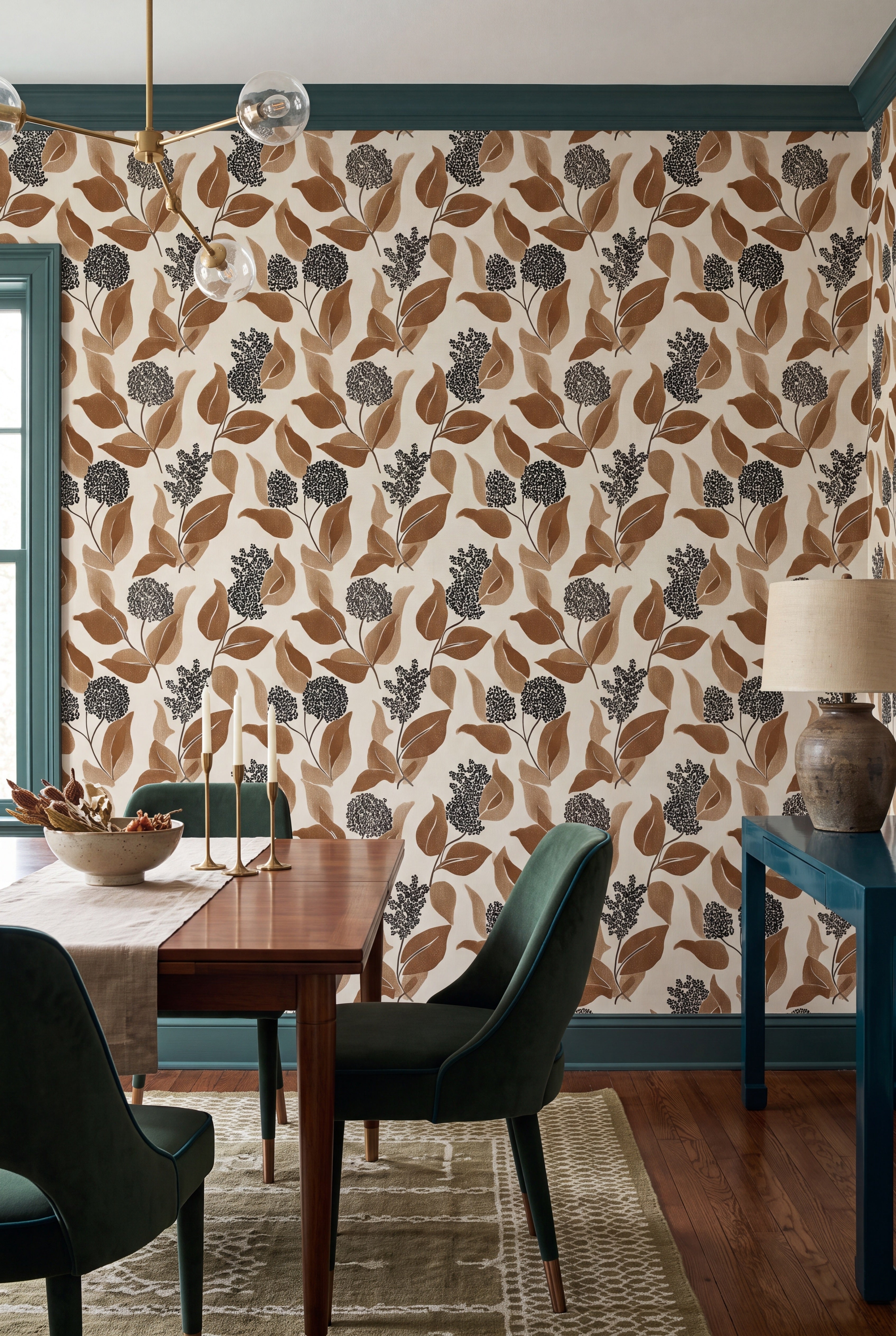 Caramel brown and black oversized leaves on cream wallpaper in a dining room.