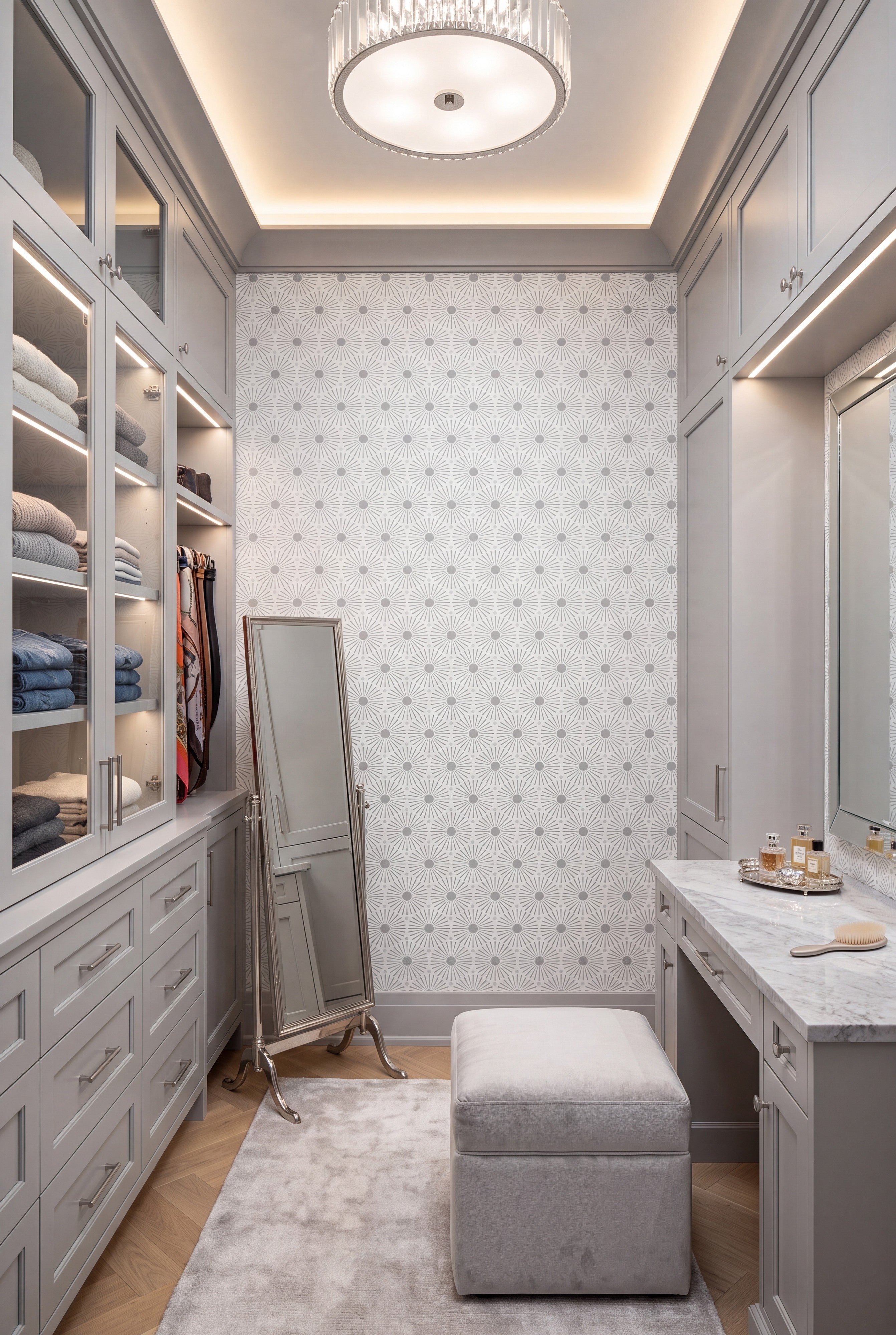 White and gray starburst dot wallpaper in a walk-in closet.
