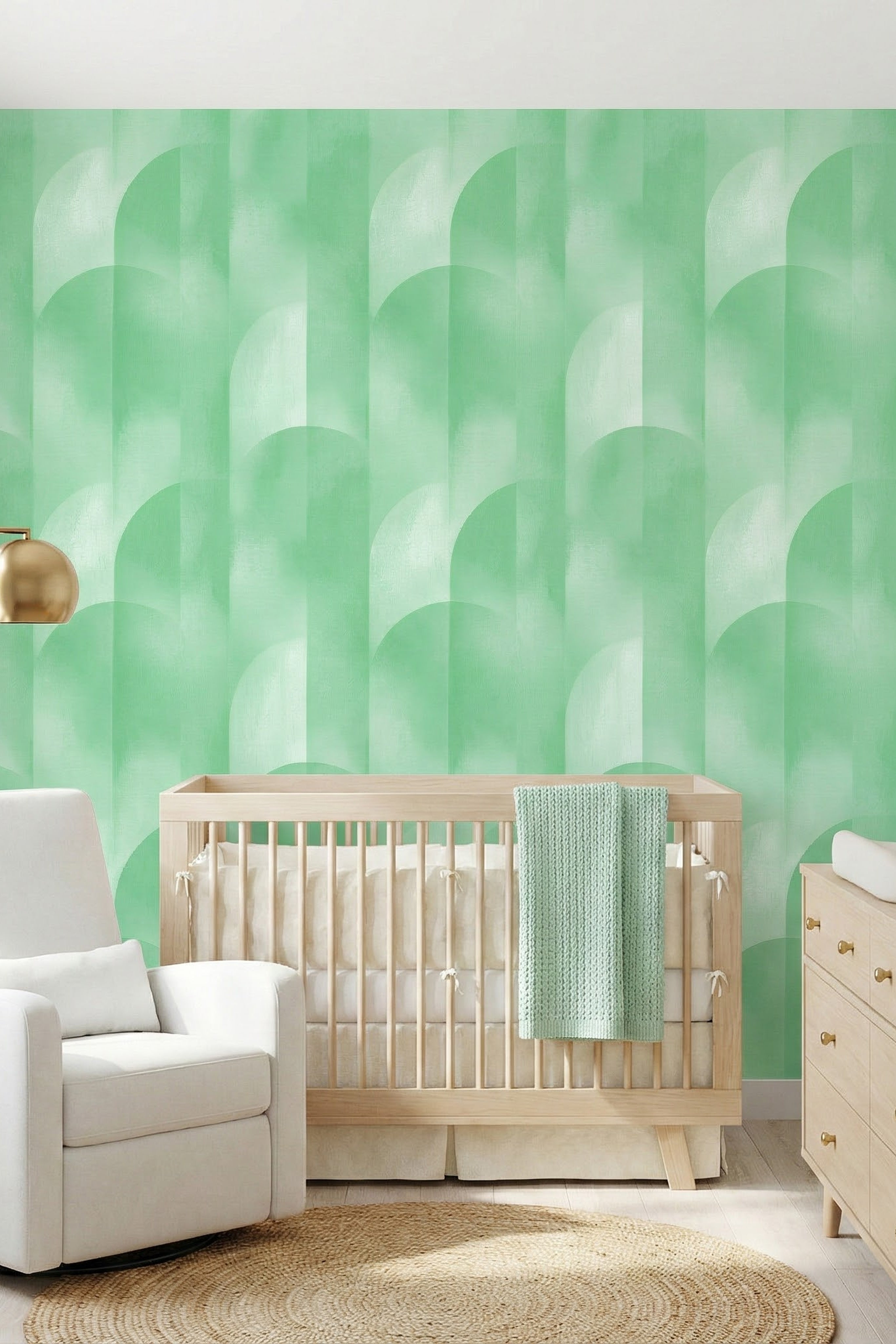 Fresh mint green arches on a light geometric wallpaper in a nursery.