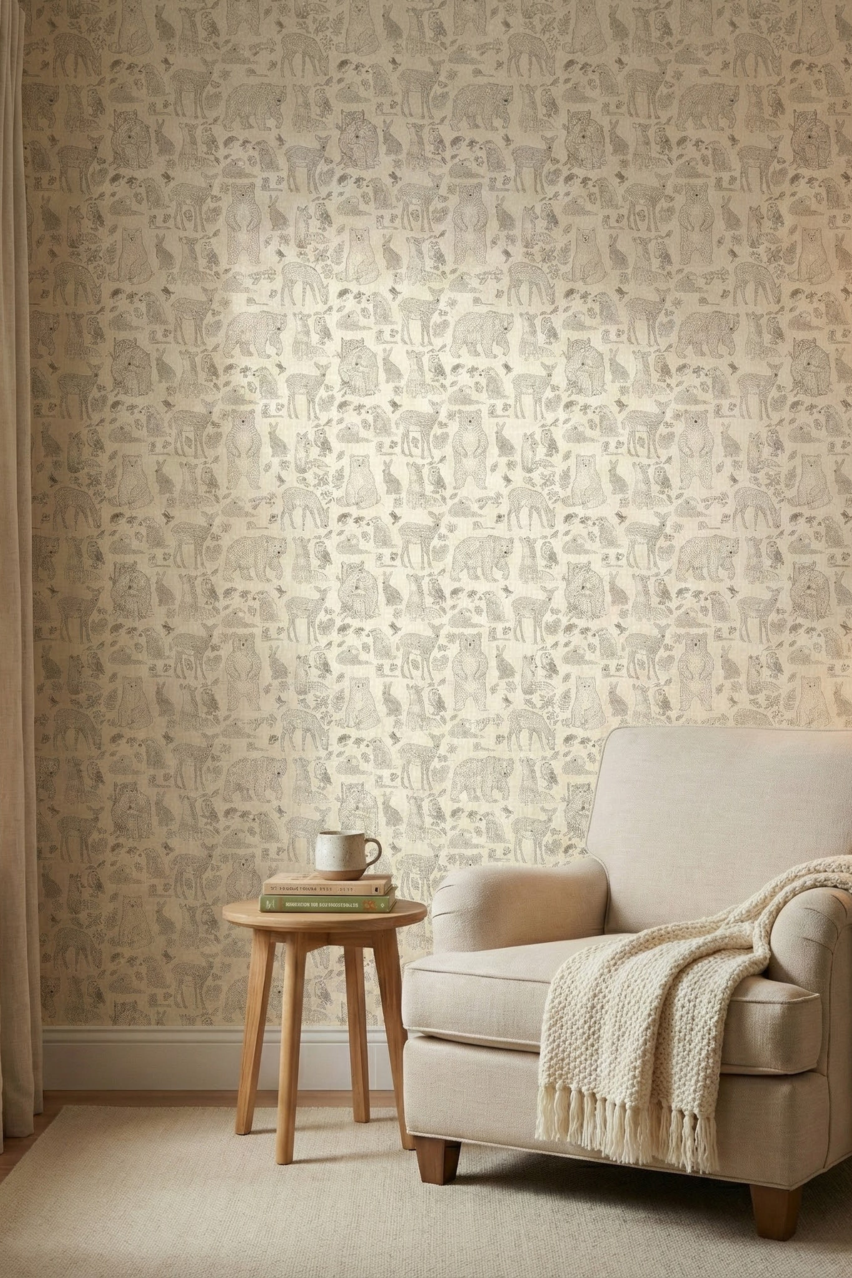 Hand-drawn woodland animals on warm linen wallpaper in a reading corner.