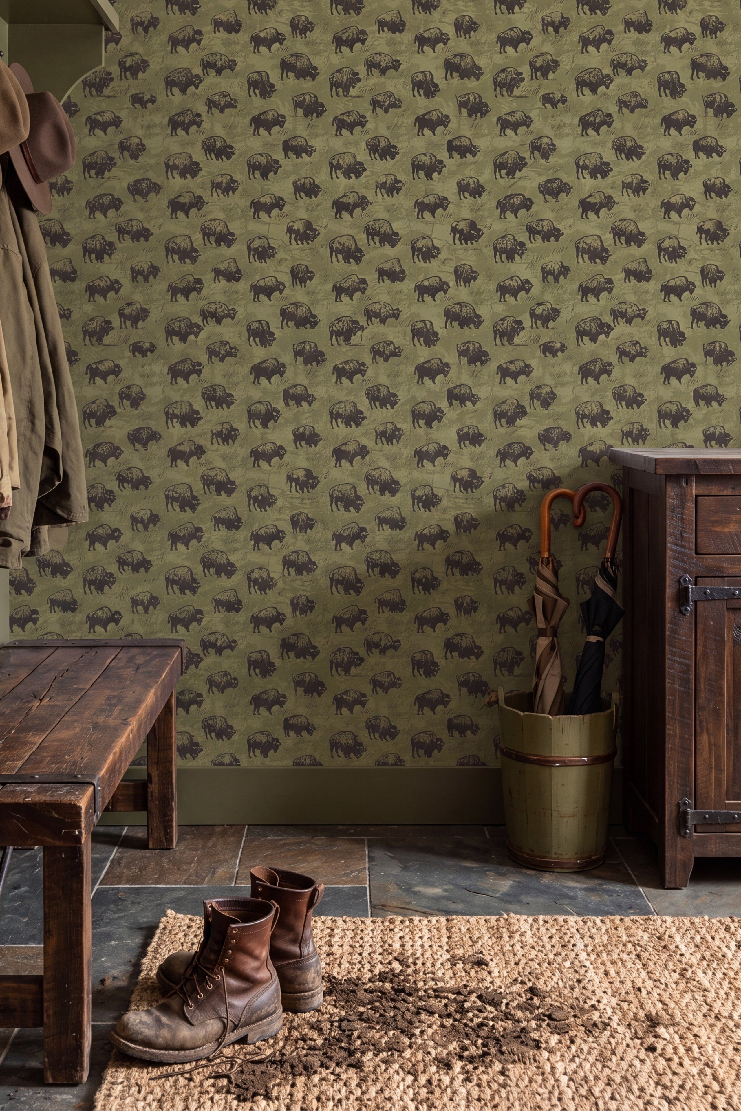 Dark brown bison on olive-green Western wallpaper in a mudroom.