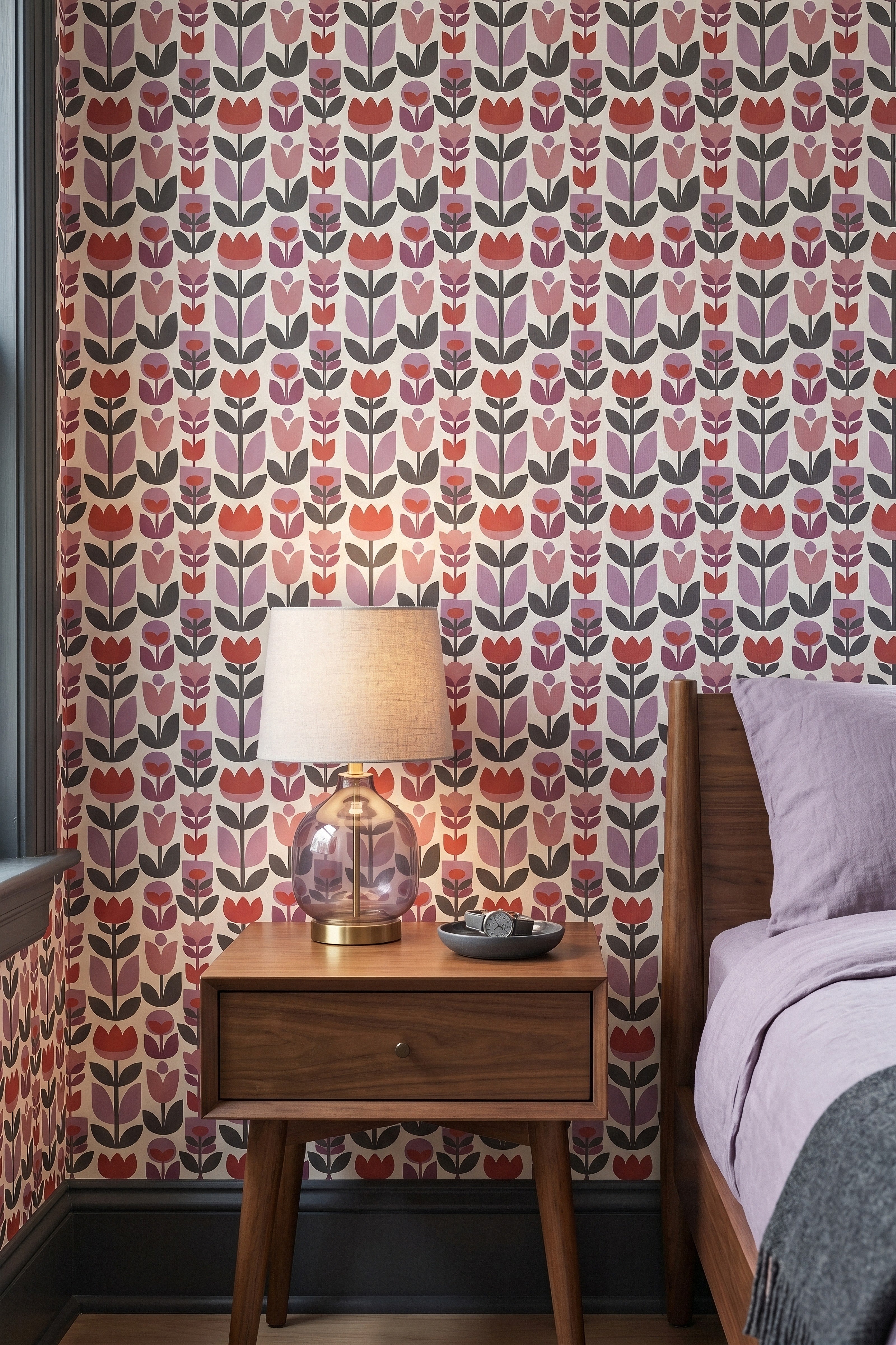 Muted red and lavender Scandinavian tulip wallpaper in a bedroom.