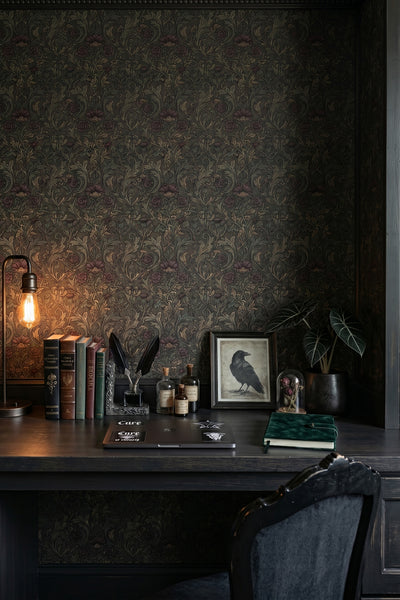 Charcoal and burgundy Morris rose damask wallpaper in a home office.