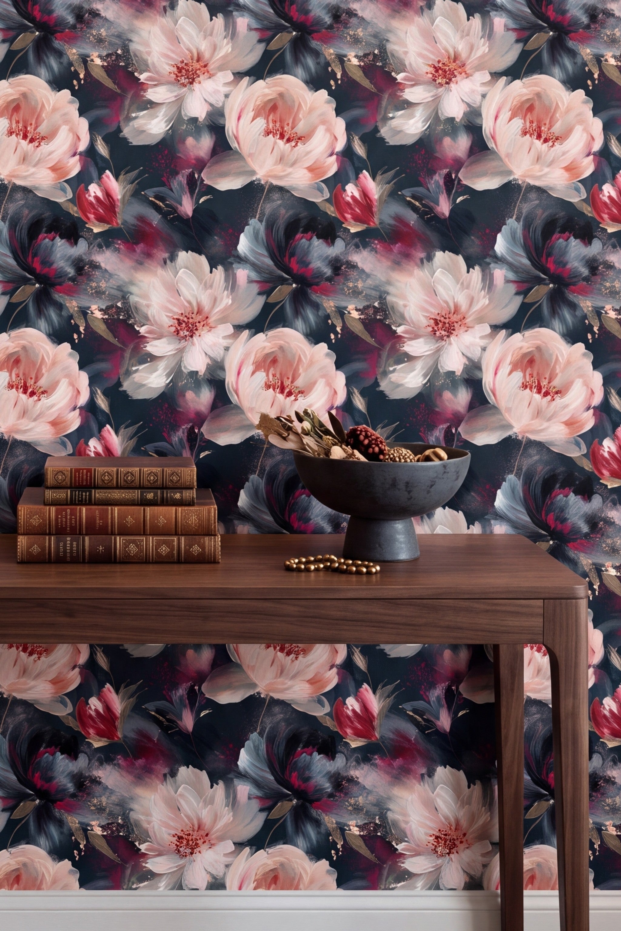 White and blush peonies on a near black floral wallpaper on an accent wall.