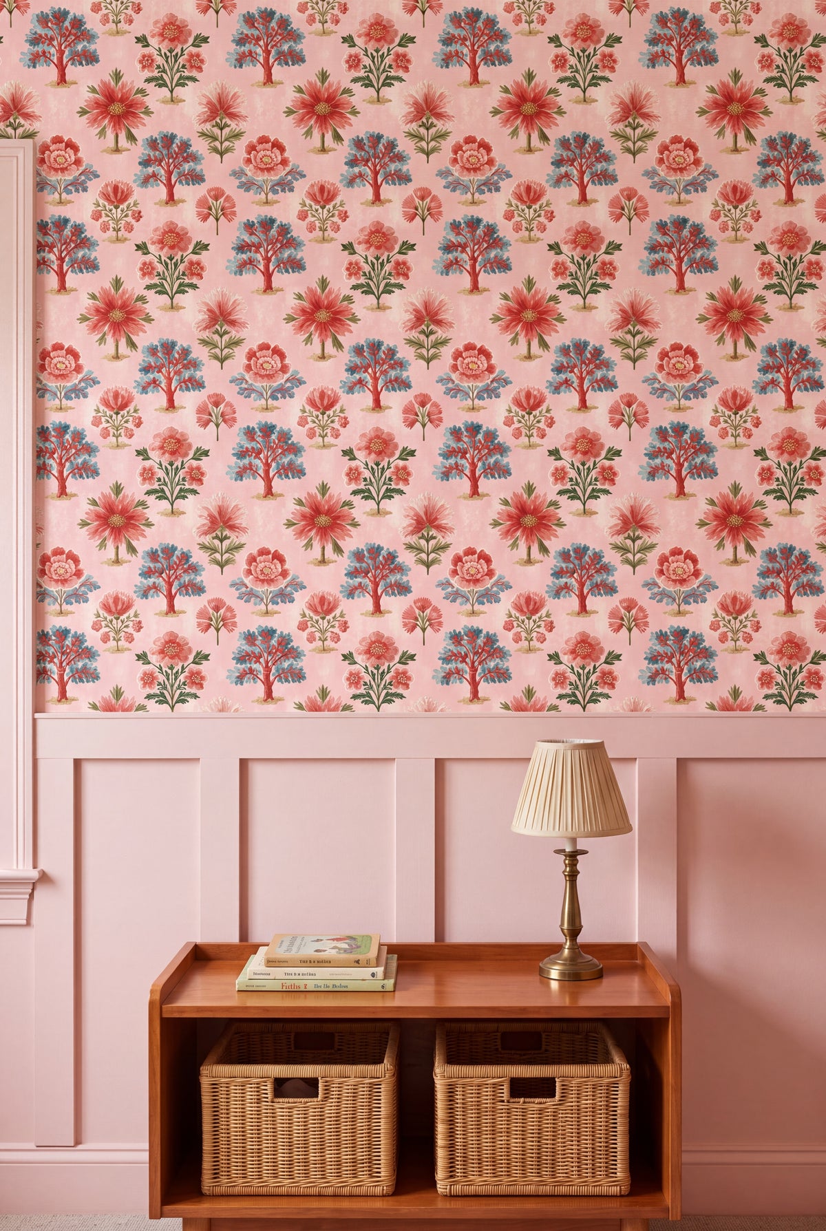 Red and teal tree of life motifs on a soft pink wallpaper in a child's room.