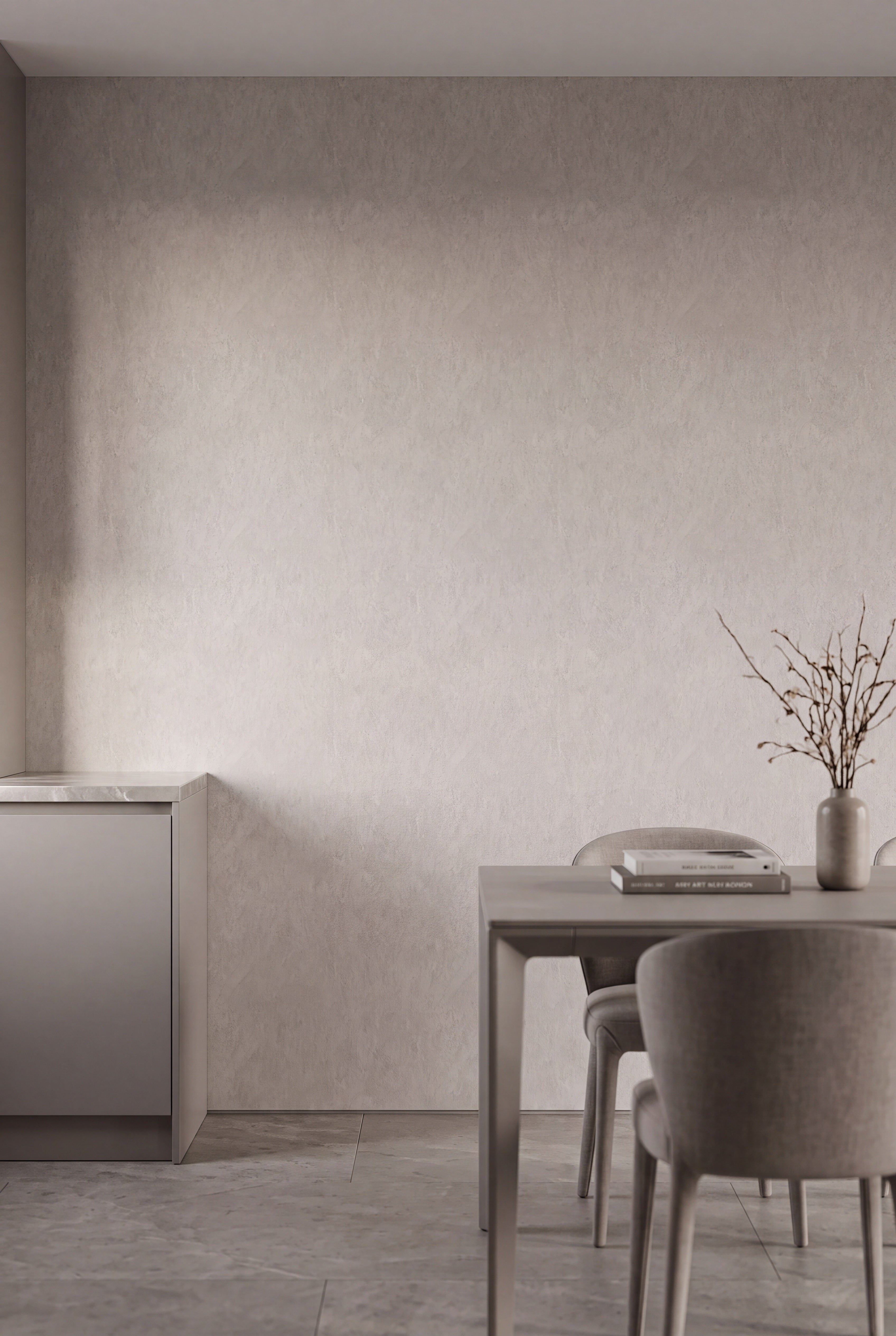 Soft greige limewash texture on a pattern-free wallpaper in a dining room.