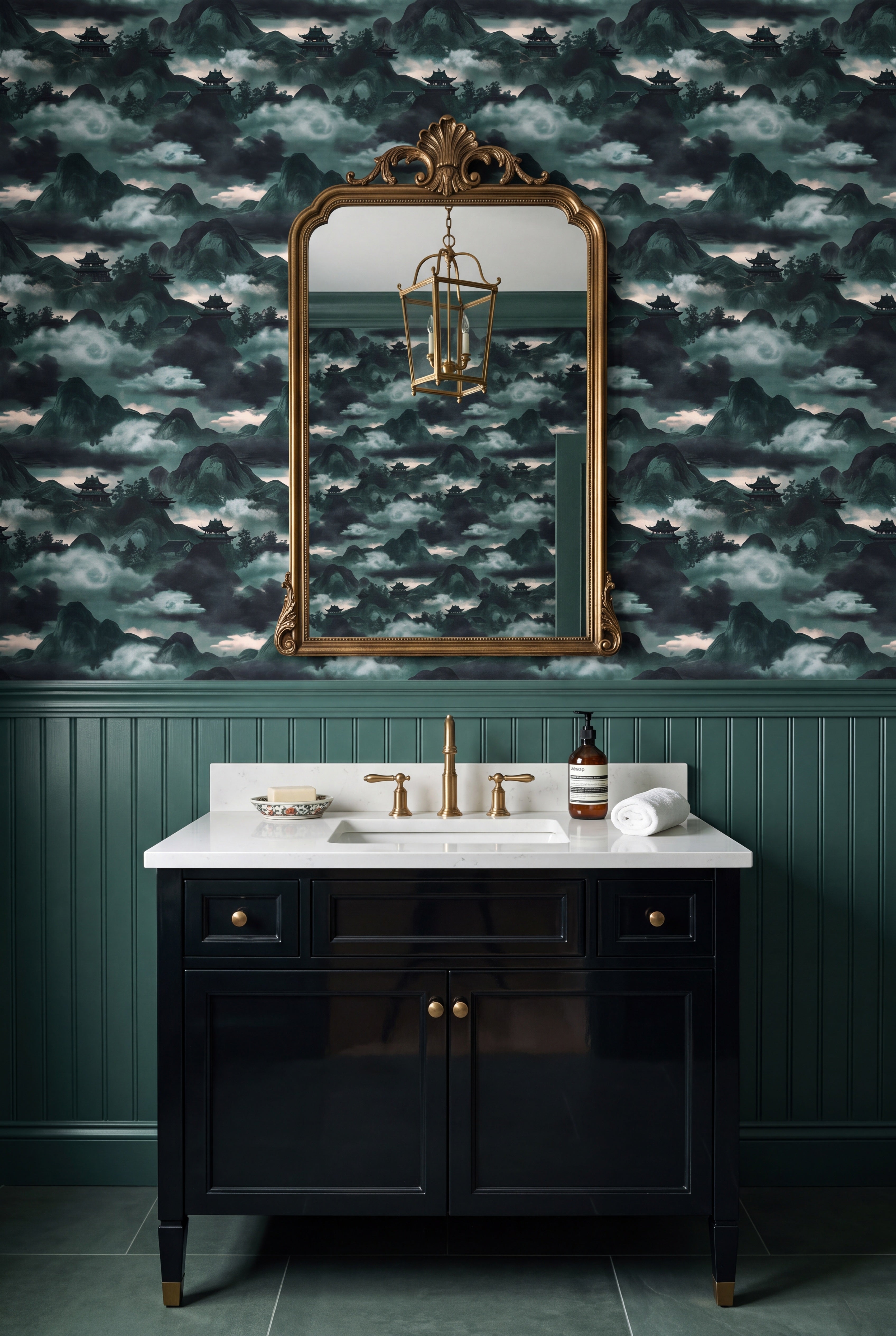 Jade green chinoiserie mountain and pagoda mural wallpaper in a bathroom.