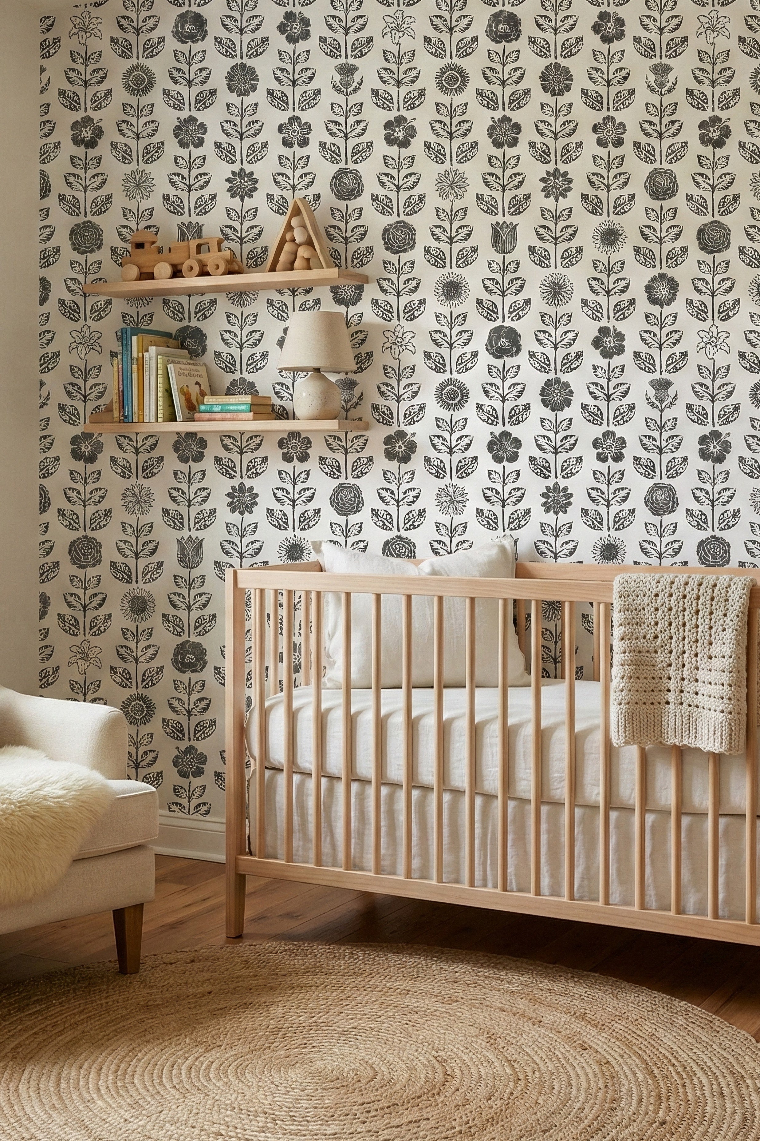 Ink Folk wallpaper shown in a nursery