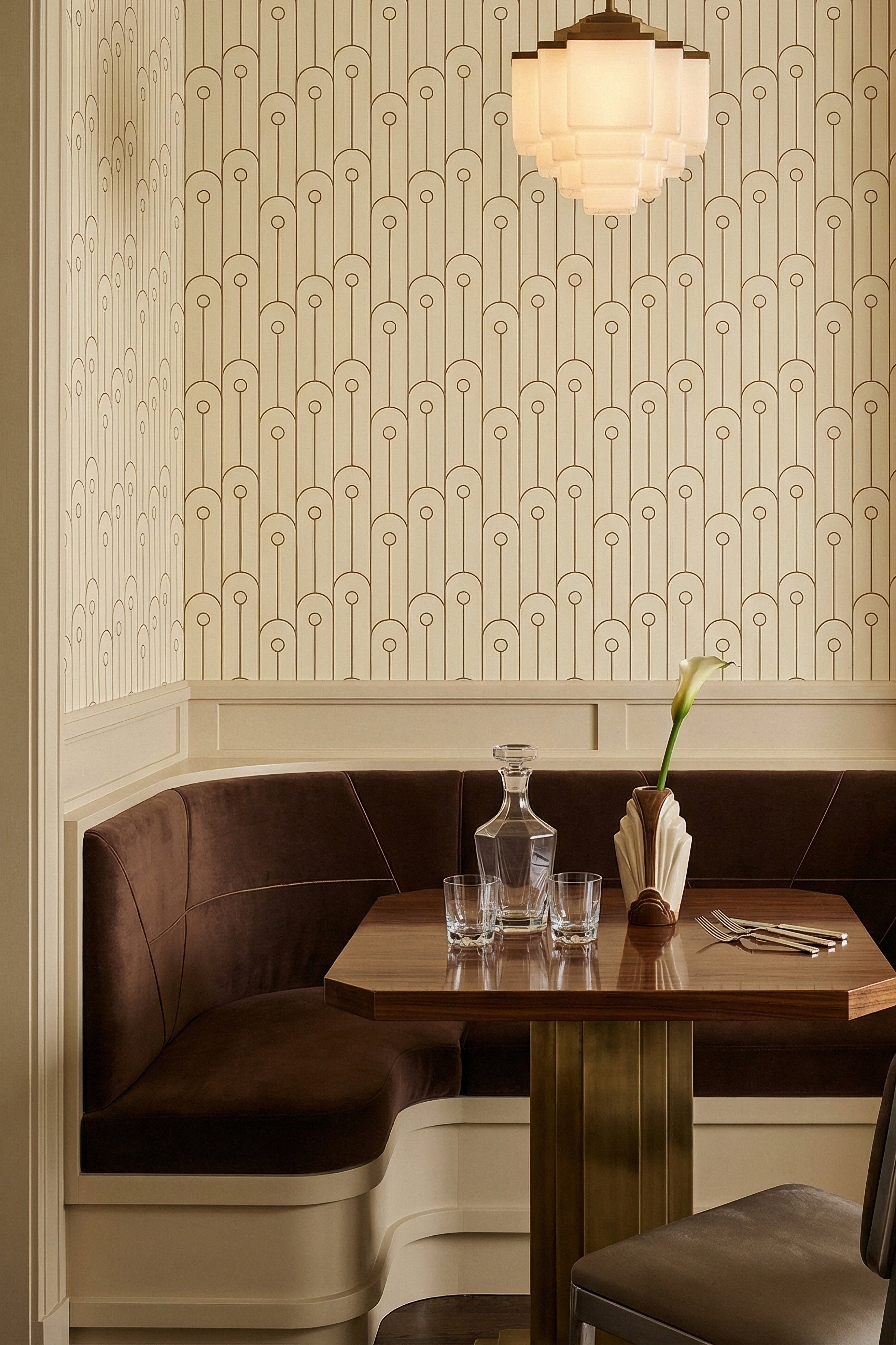 Grand Arcade wallpaper shown in a cozy nook
