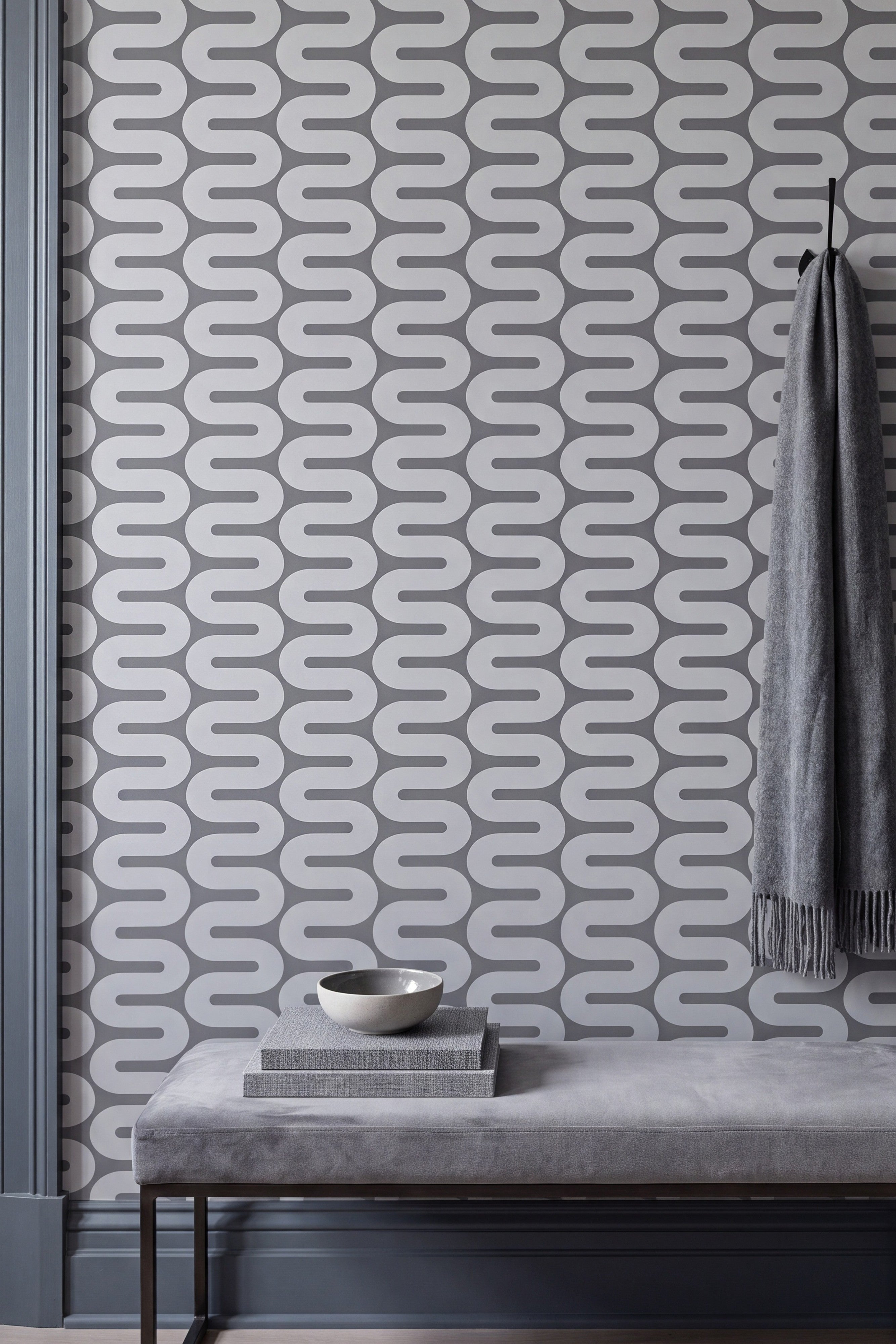 Charcoal Wave wallpaper shown on an accent wall