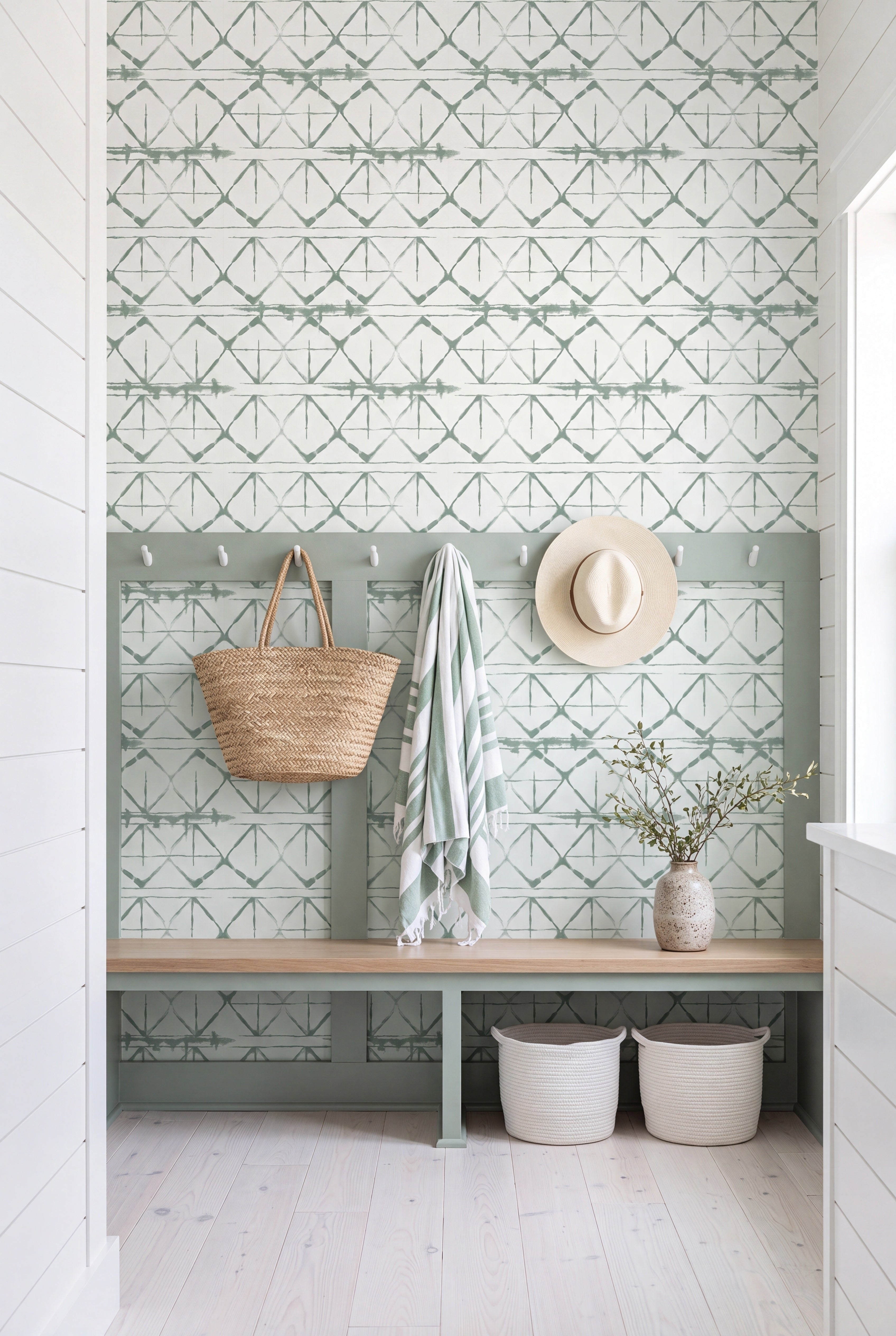 Sage Shibori wallpaper shown in a mudroom