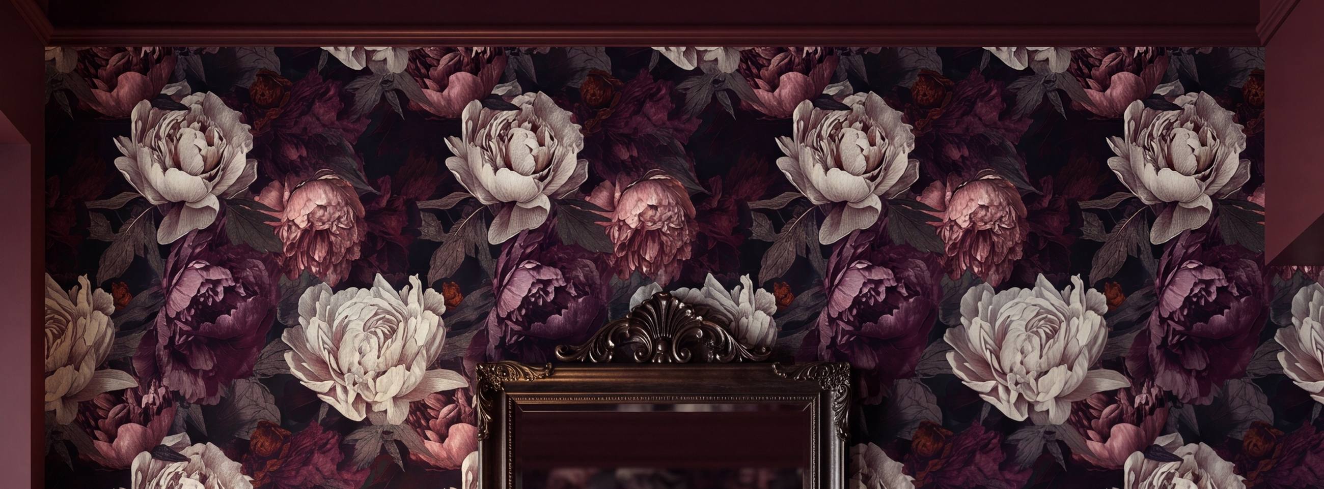 Dark plum peony wallpaper in an entryway with an ornate mirror