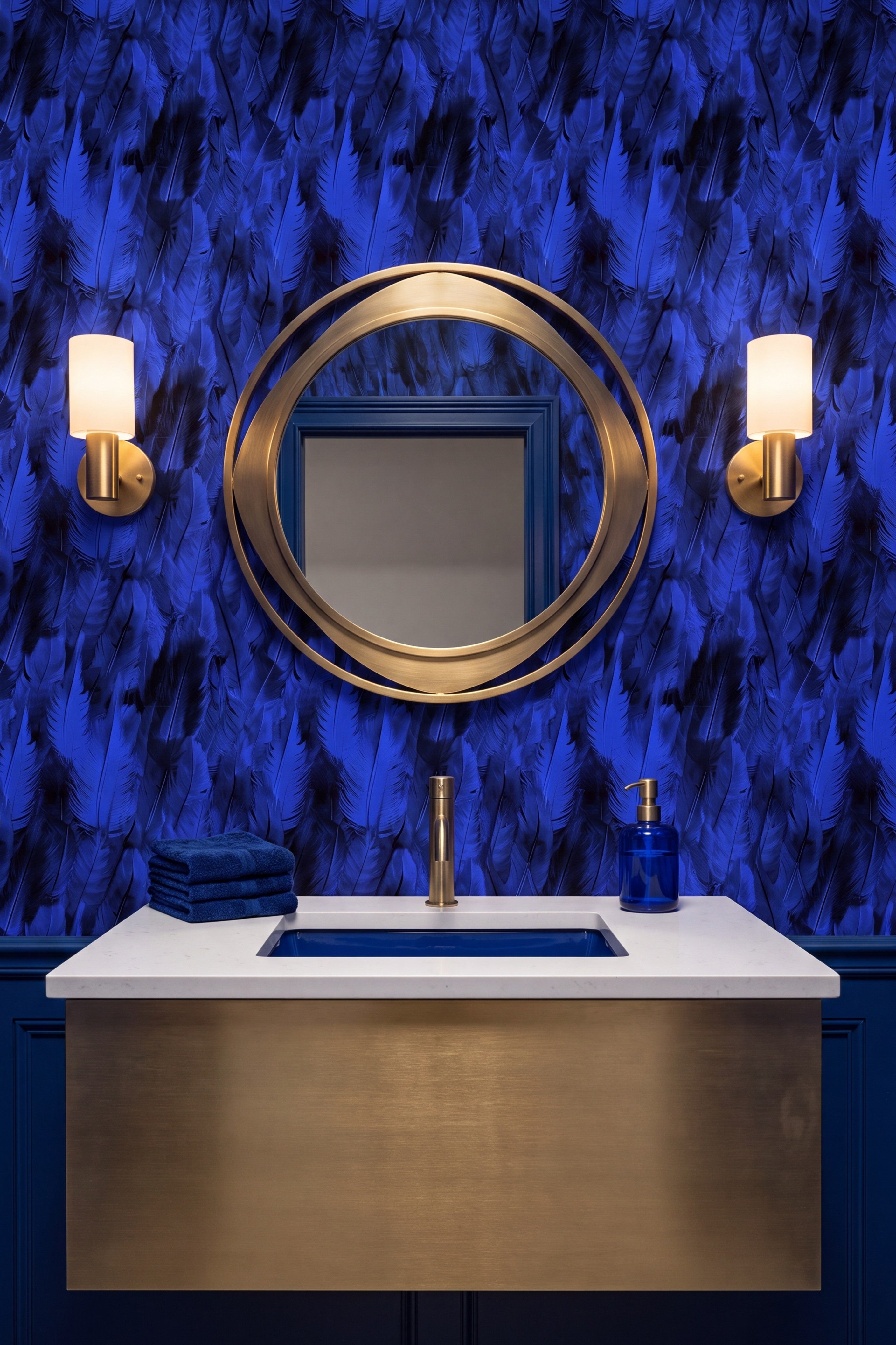Layered cobalt blue feathers on a dark ground wallpaper in a powder room.