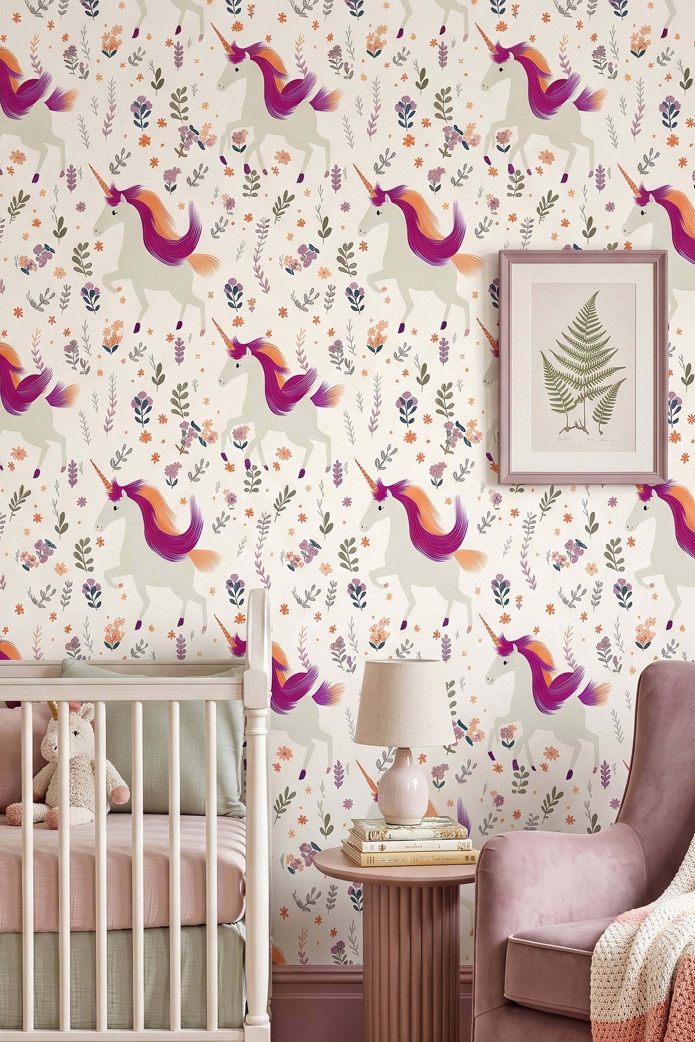 Purple and peach prancing unicorns among soft pastel botanicals wallpaper in a nursery.