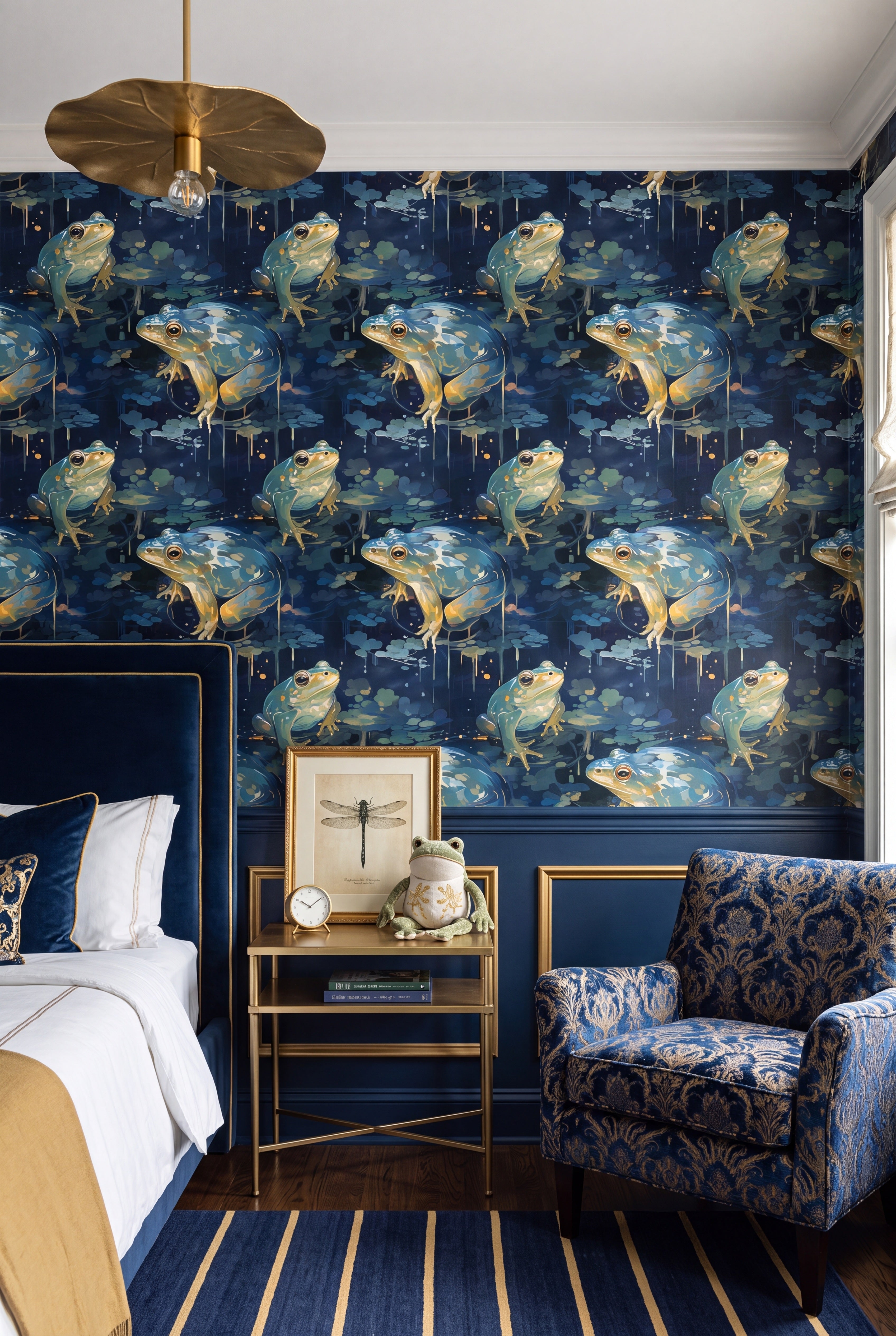 Watercolor frogs on a moody indigo-blue wallpaper in a bedroom.