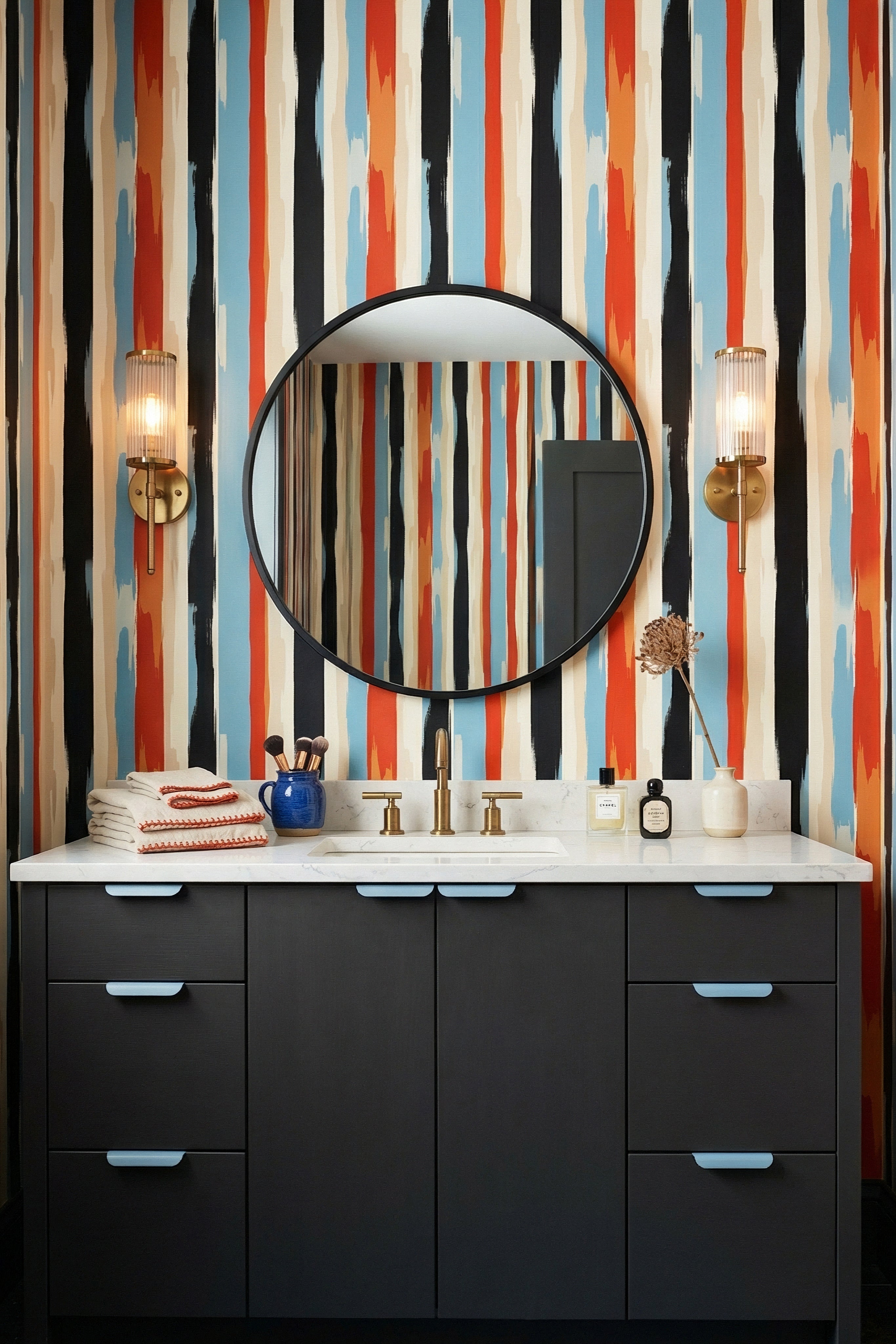 Coral and sky blue hand-painted vertical stripe wallpaper in a powder room.