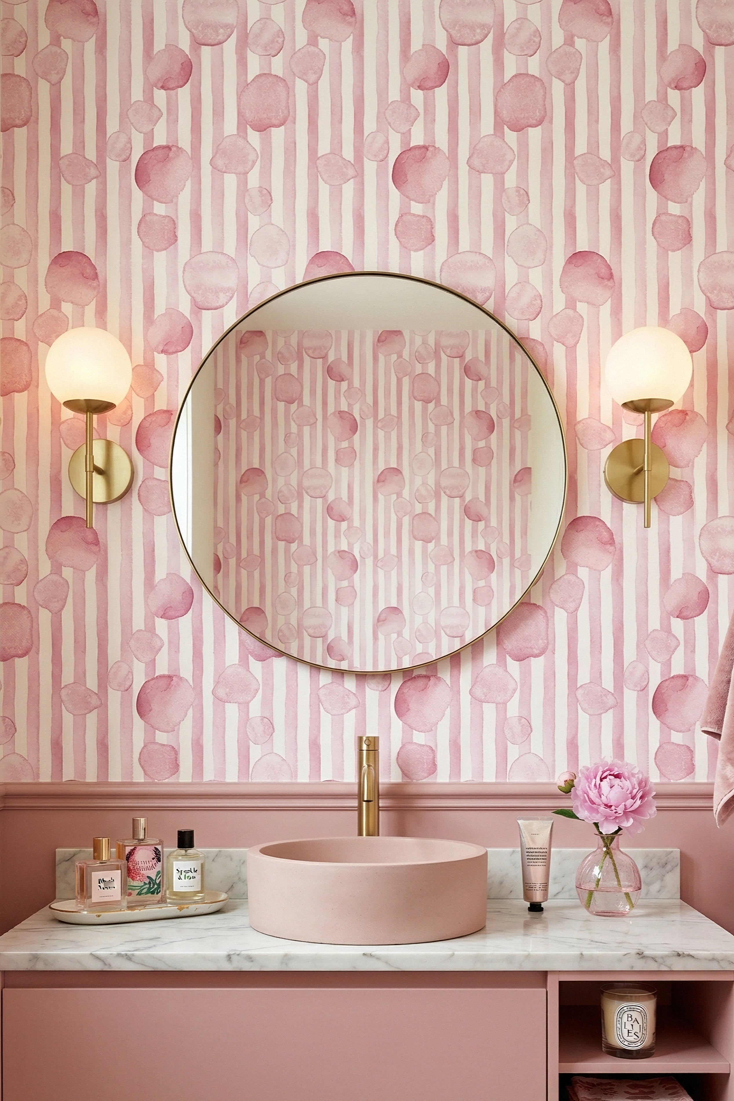 Pink watercolor dots over soft white stripes wallpaper in a powder room.
