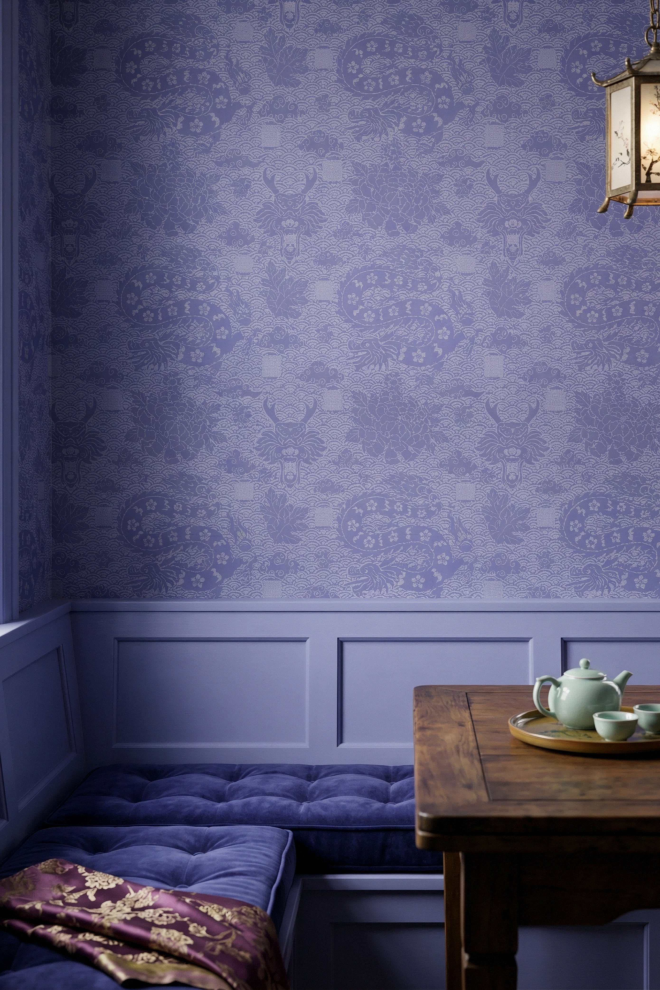 Purple dragons among waves and blossoms on ornate wallpaper in a cozy nook.