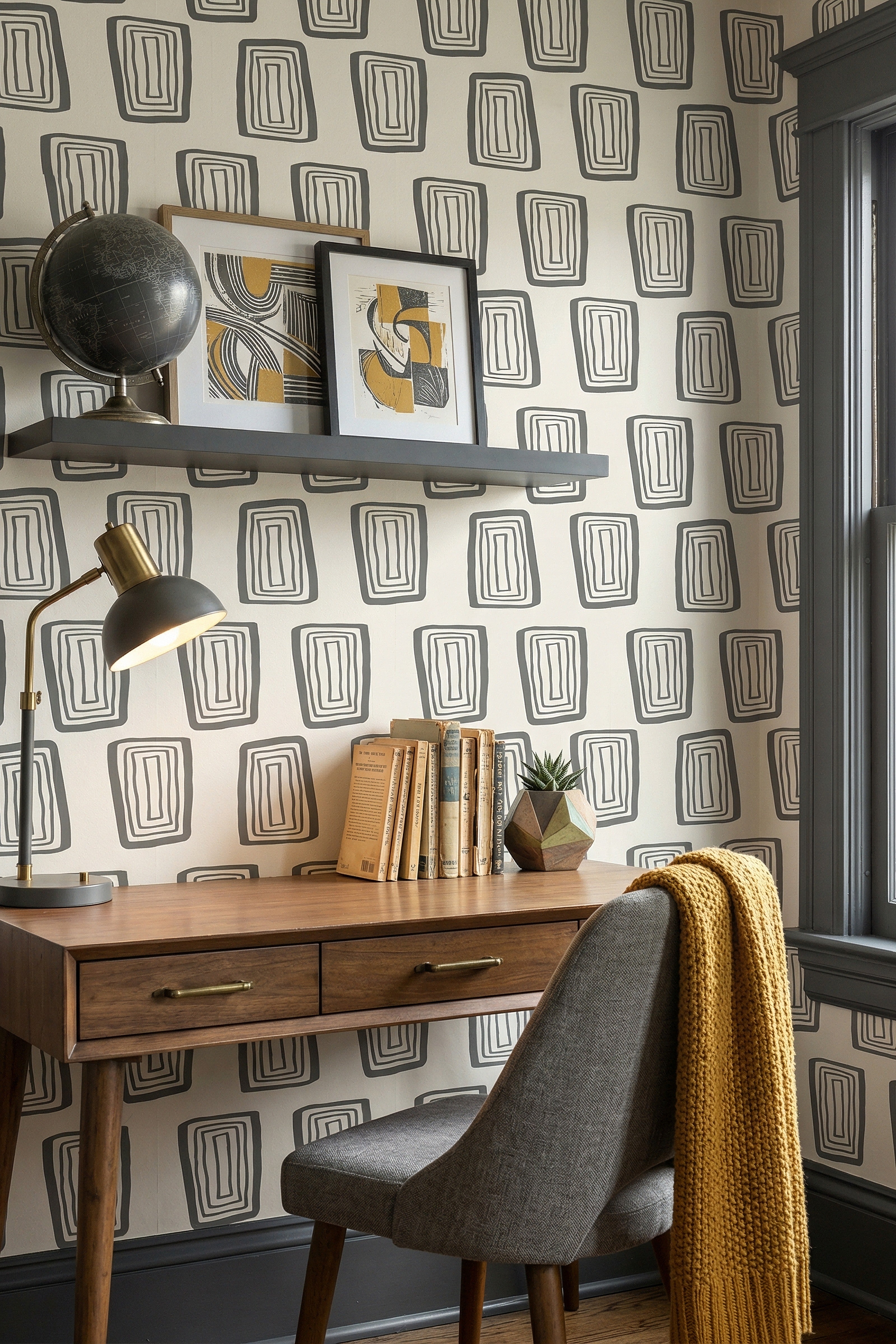 Soft gray mid-century rectangles on an off-white wallpaper in a home office.