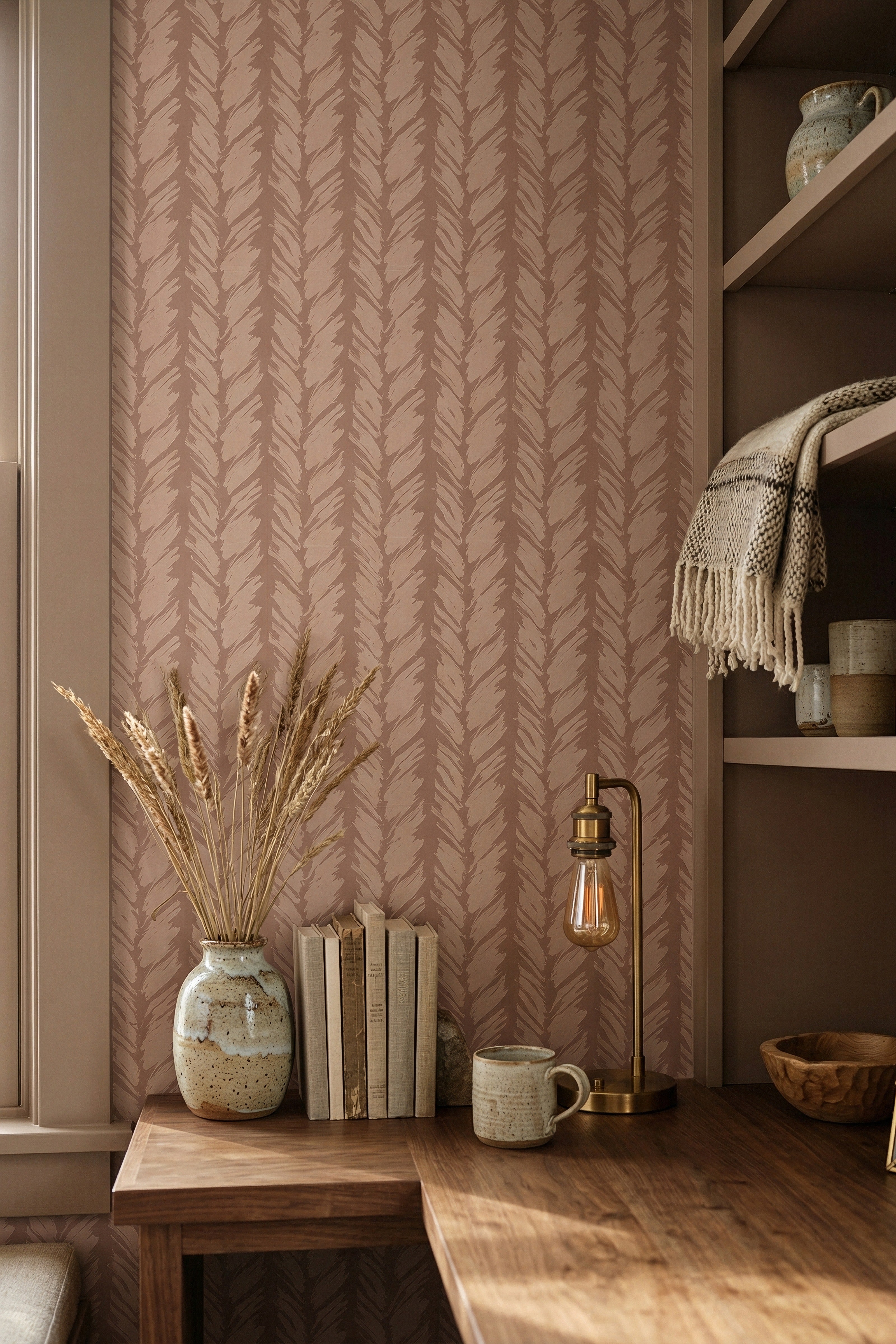 Blush brushstrokes on a rich mocha striped wallpaper in a home office.