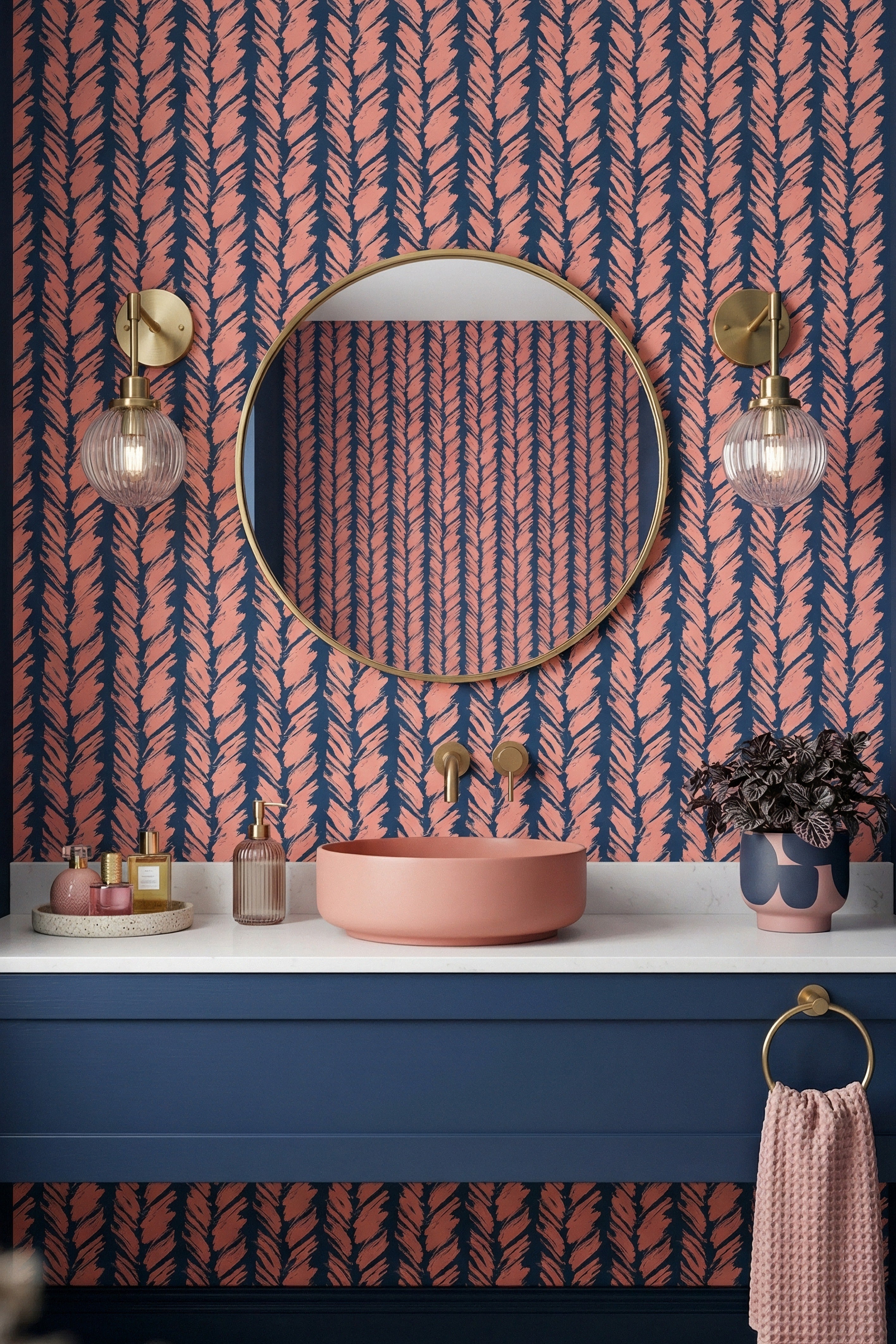 Coral brushstrokes on a deep navy striped wallpaper in a powder room.