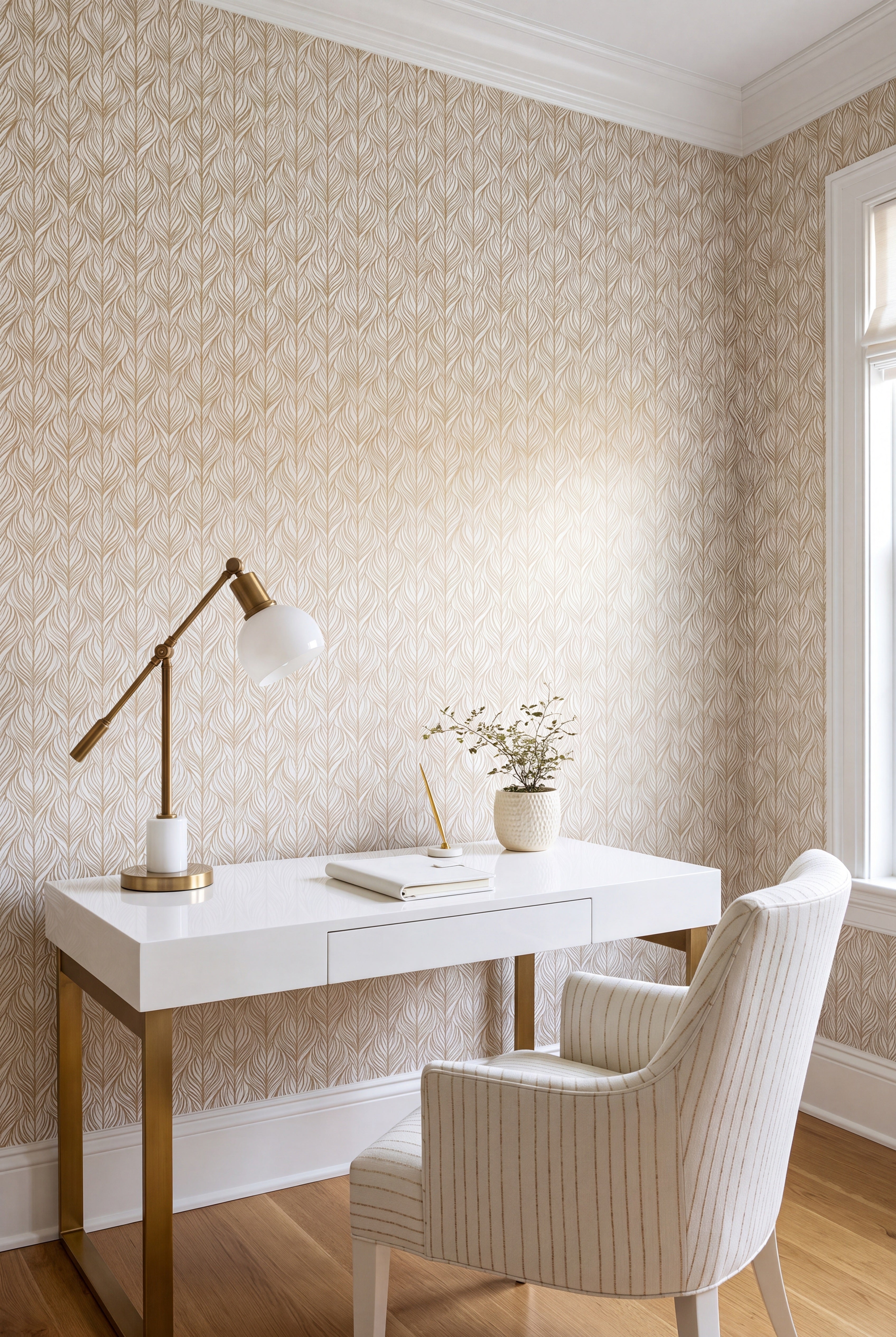 Flowing gold abstract line forms on a light wallpaper in a home office.