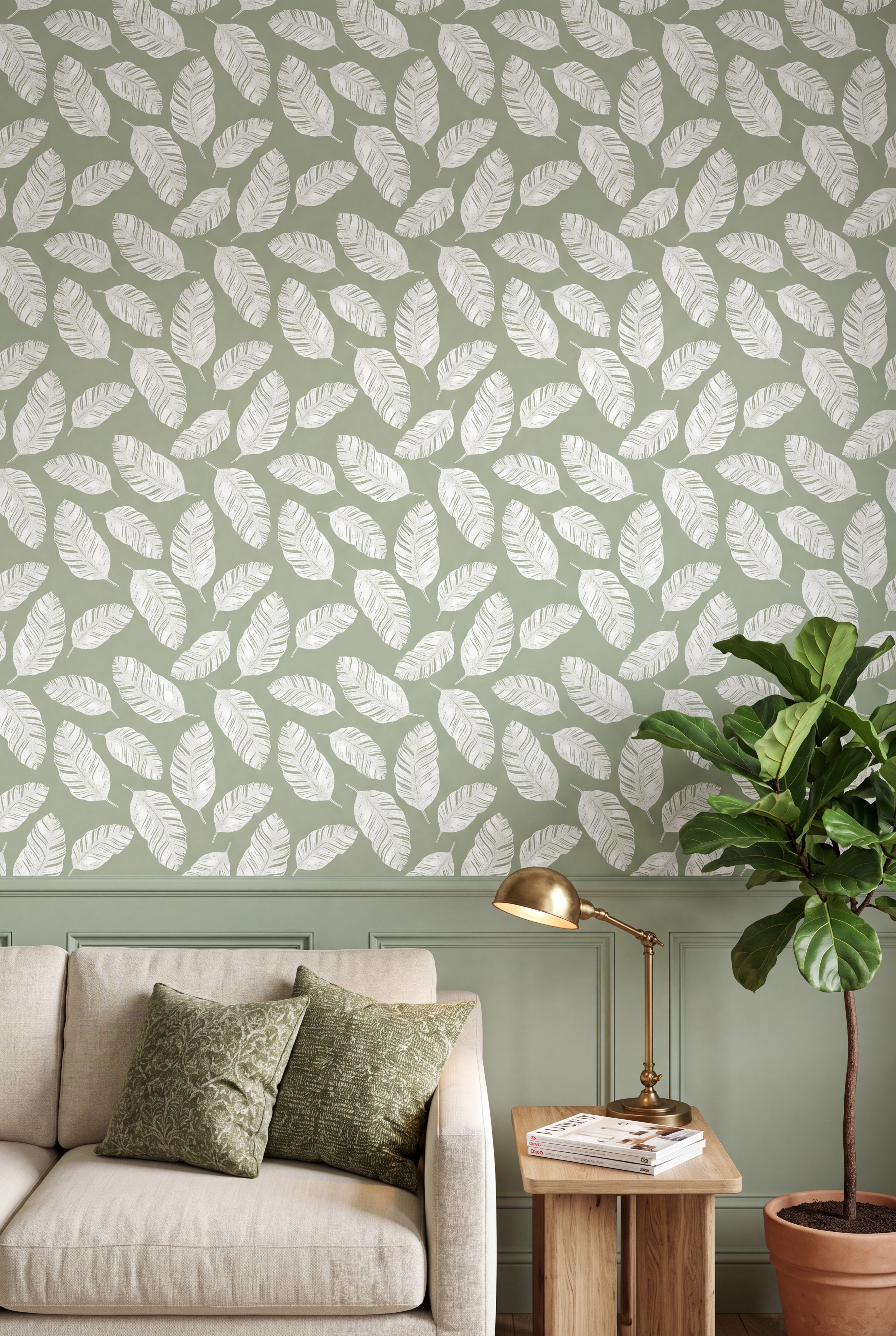 White banana leaves on soft sage green wallpaper in a living room.