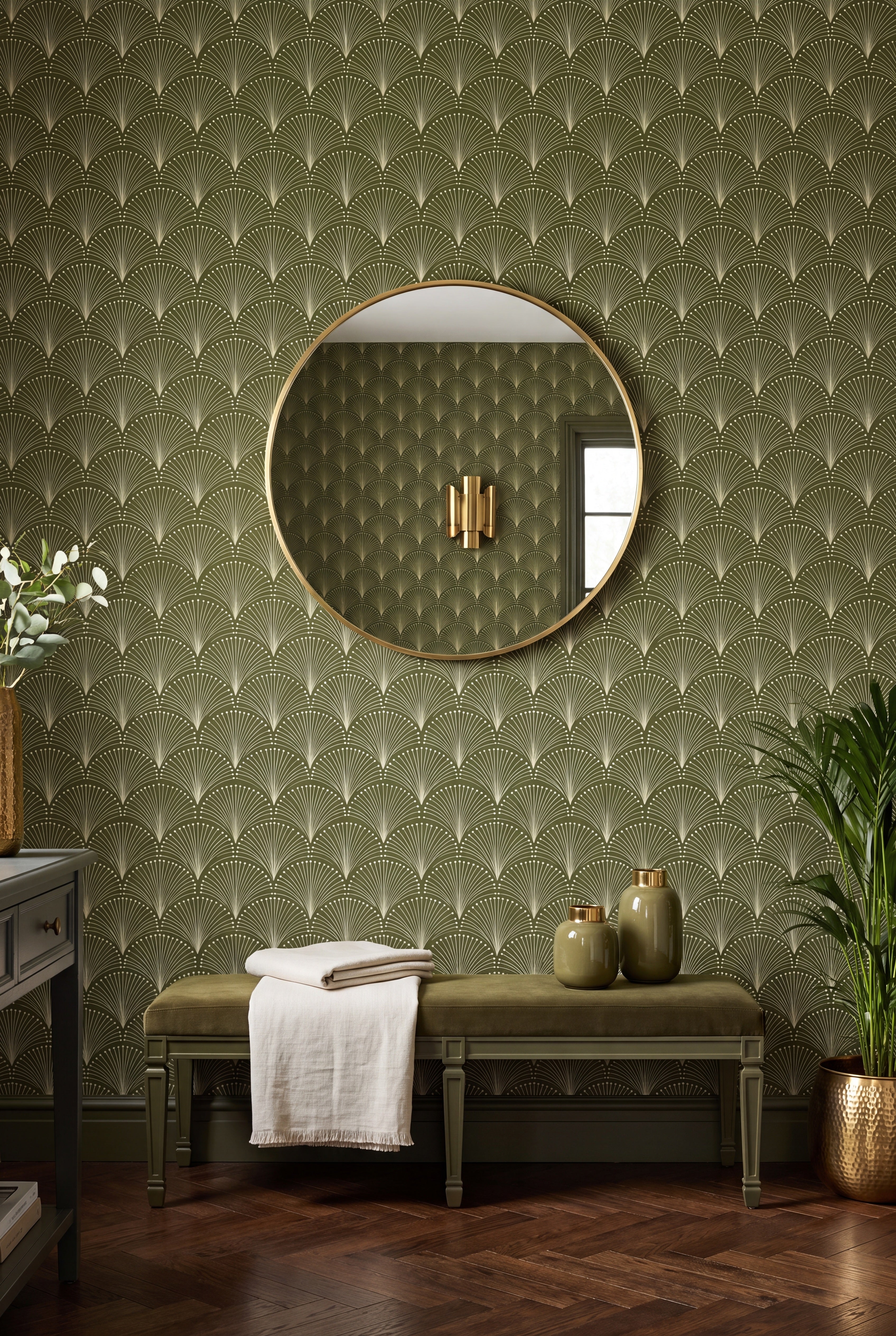 Ivory Art Deco fan arches on deep green wallpaper on an accent wall.