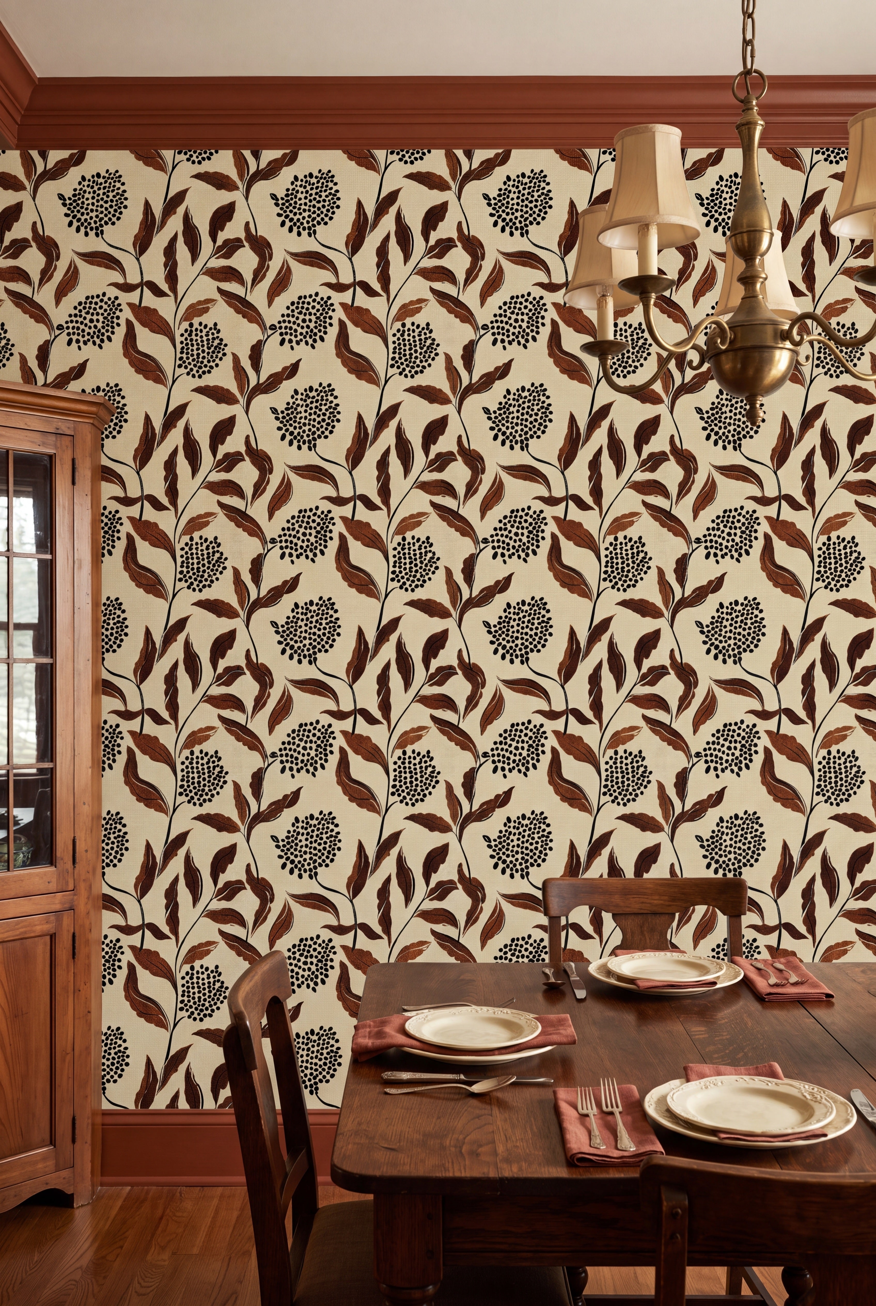 Rust-brown leaves on a faux-linen wallpaper in a dining room.