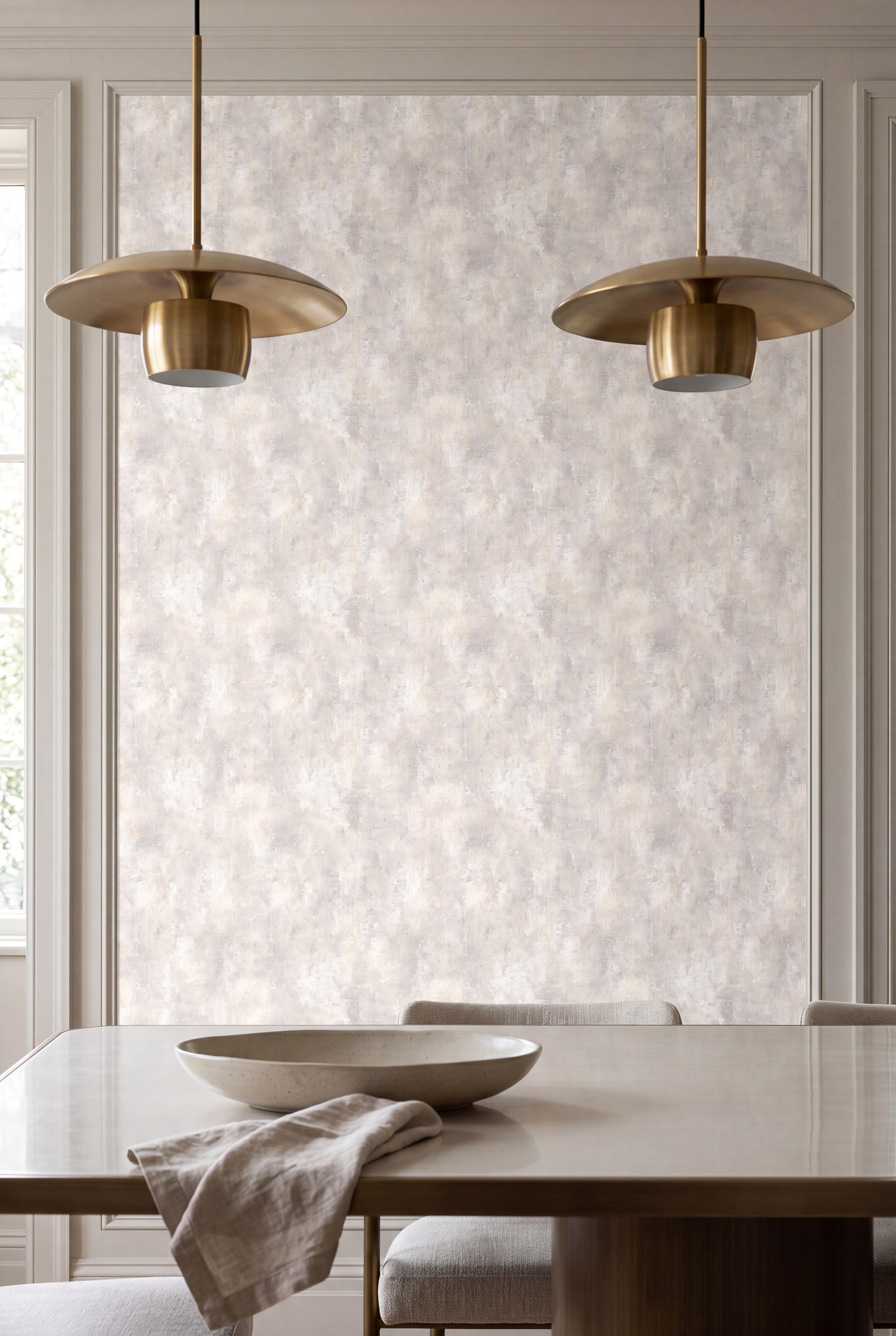 Soft grey-beige limewash-effect plaster wallpaper in a dining room.