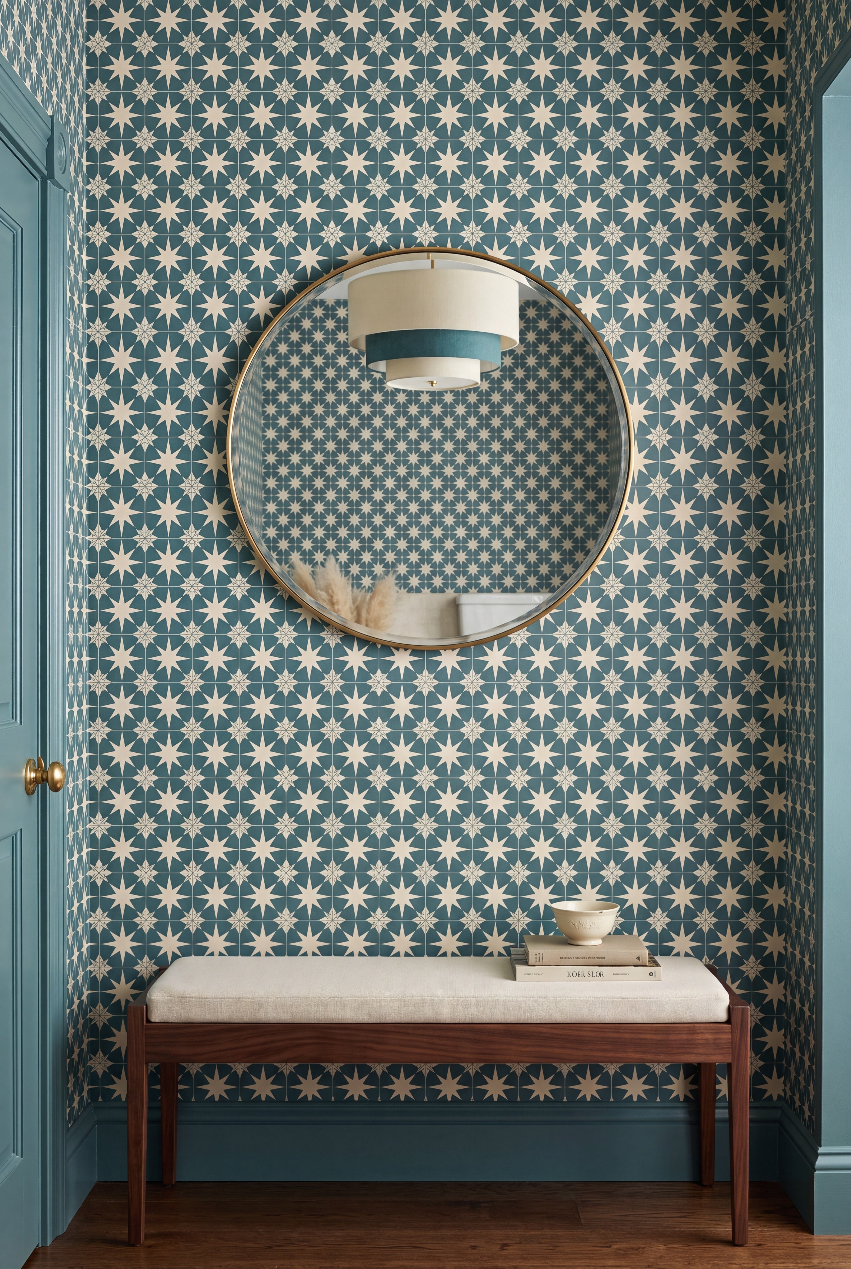 Teal and beige Moroccan star-tile wallpaper on an accent wall.