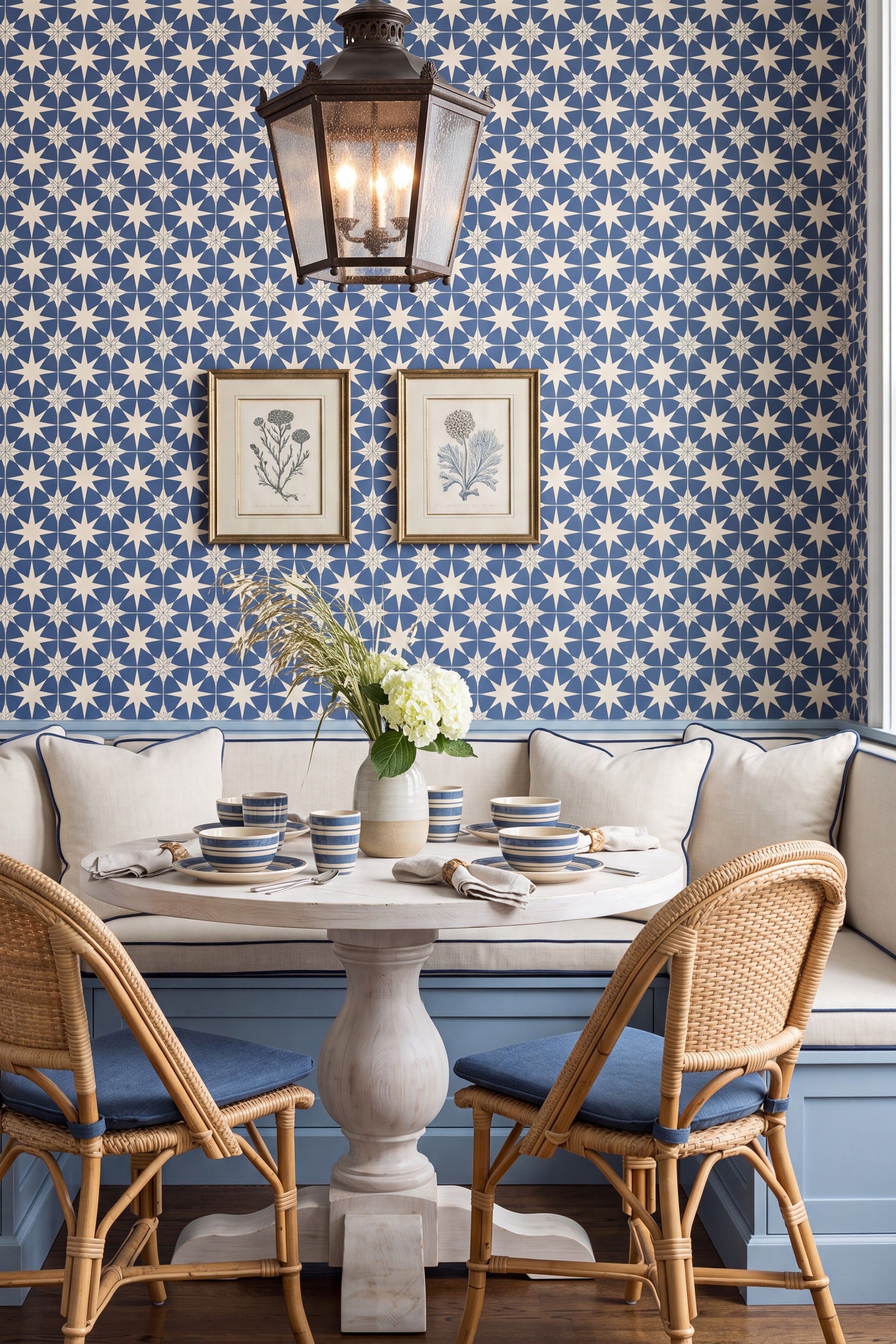Navy and white star tile wallpaper in a breakfast nook.