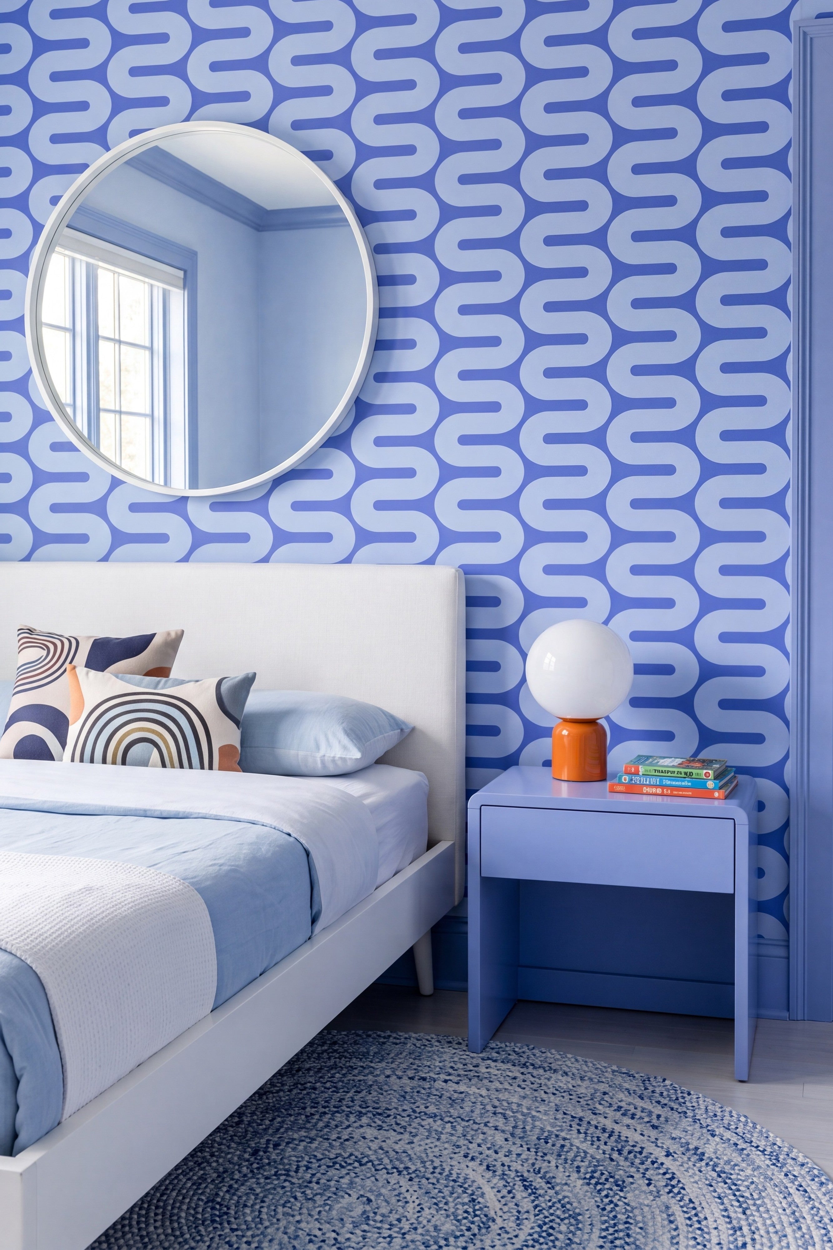 Periwinkle blue geometric wallpaper in a kids room.