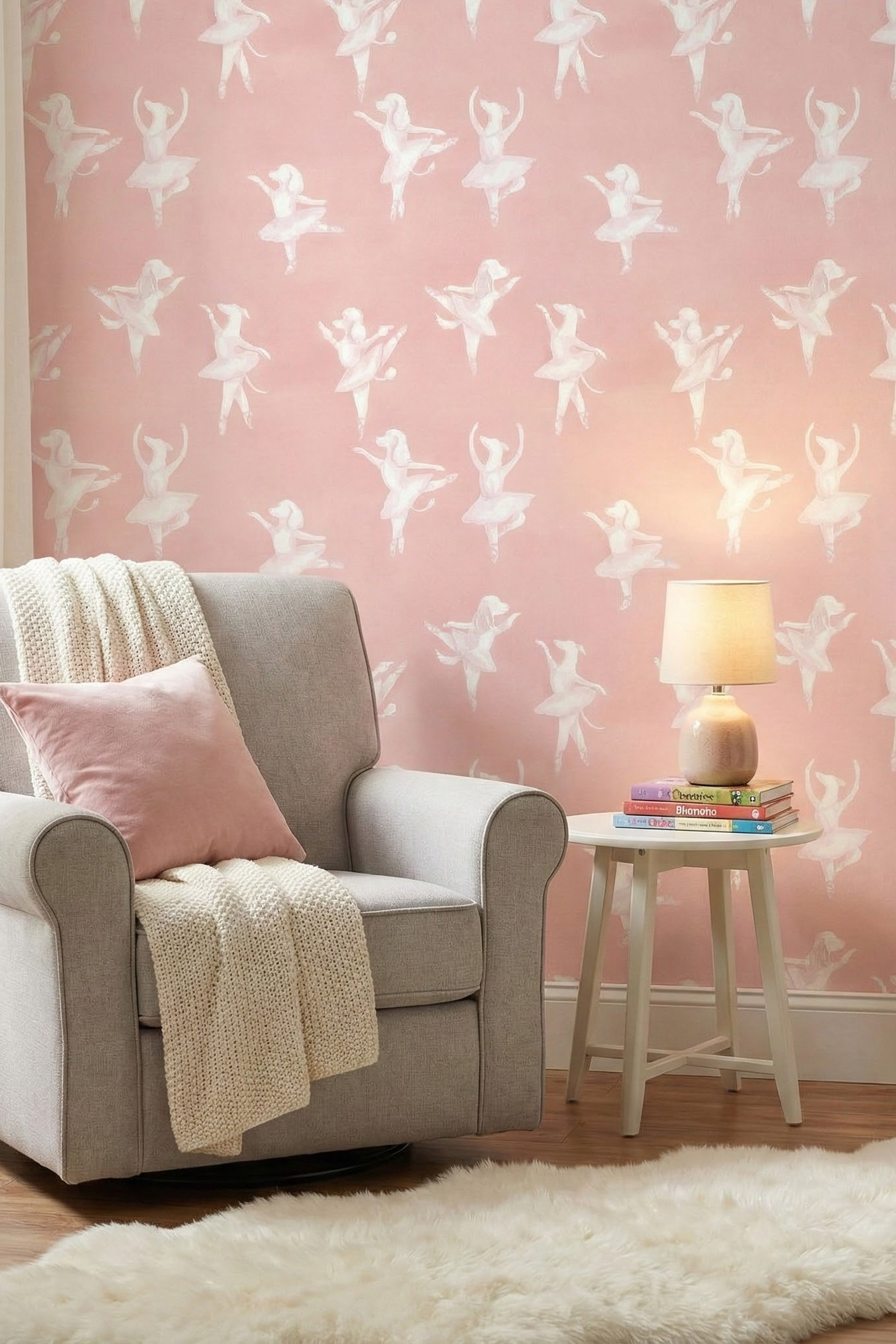 Twirling puppies on a soft blush pink wallpaper in a reading corner.