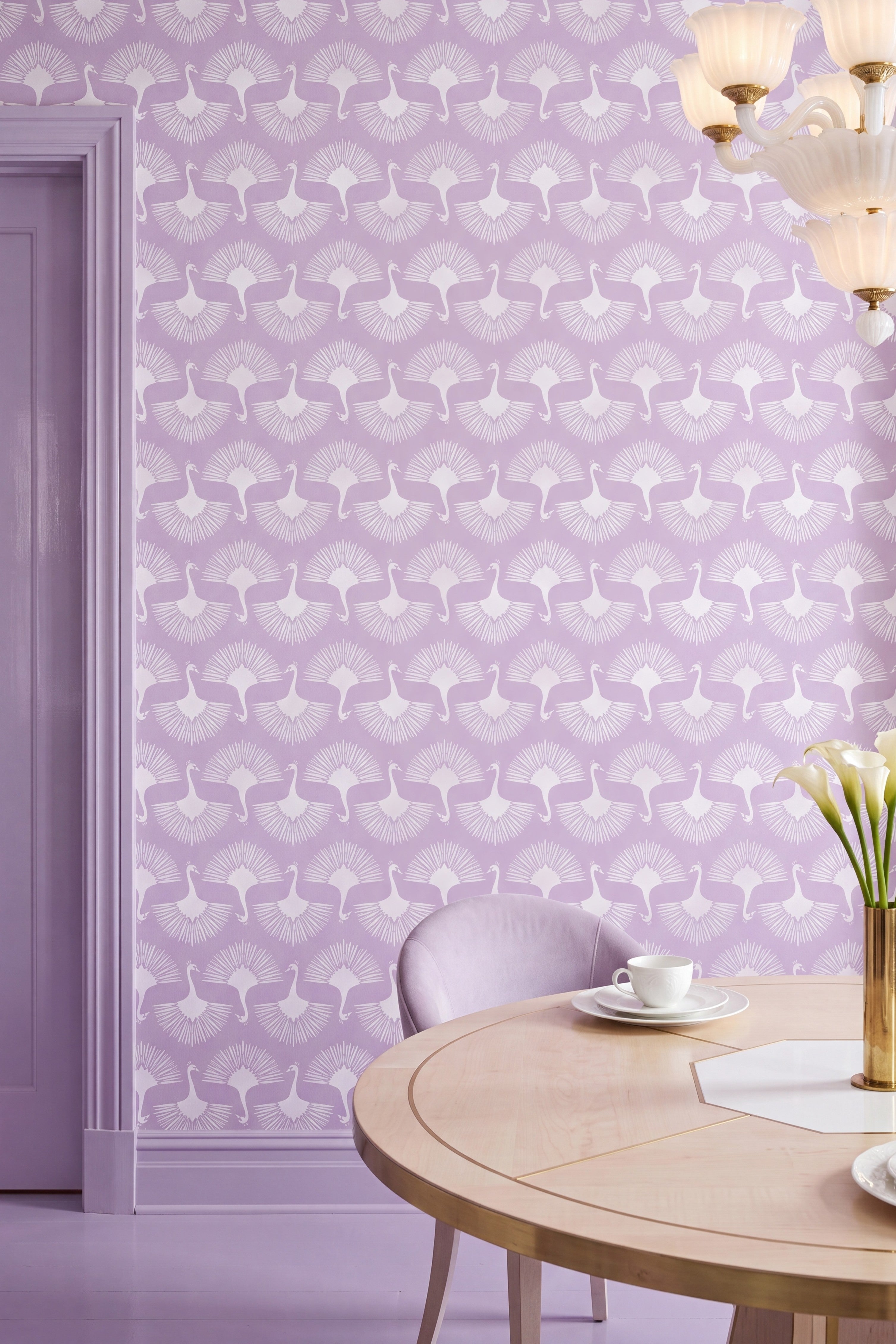 Soft lilac peacock tails on a pale Art Deco wallpaper in a dining room.