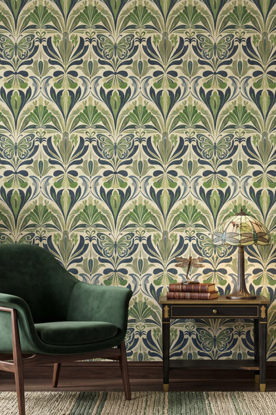 Navy and forest green butterflies and botanicals on wallpaper in a cozy nook.