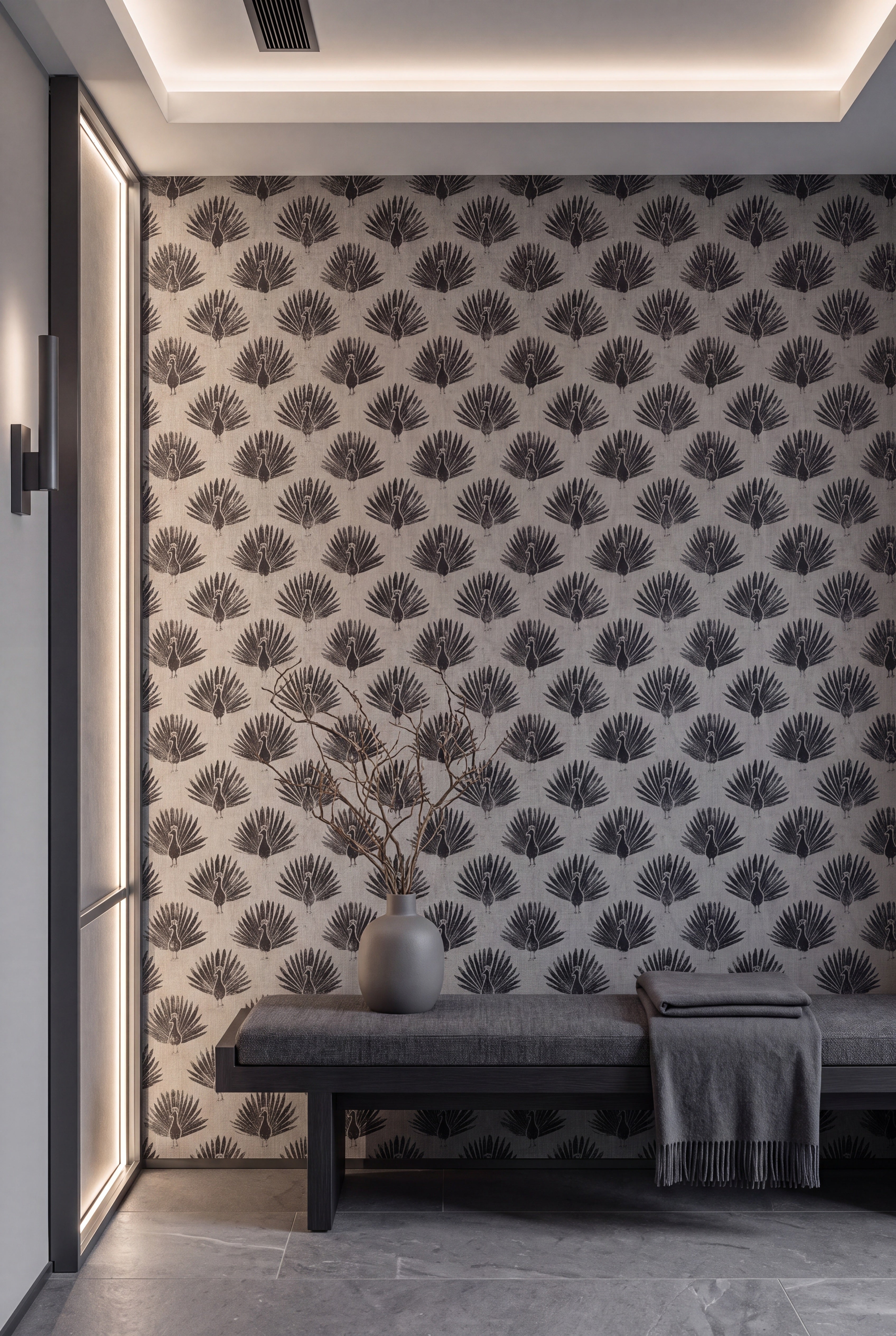 High-contrast black-and-white peacock fans on accent wall wallpaper.