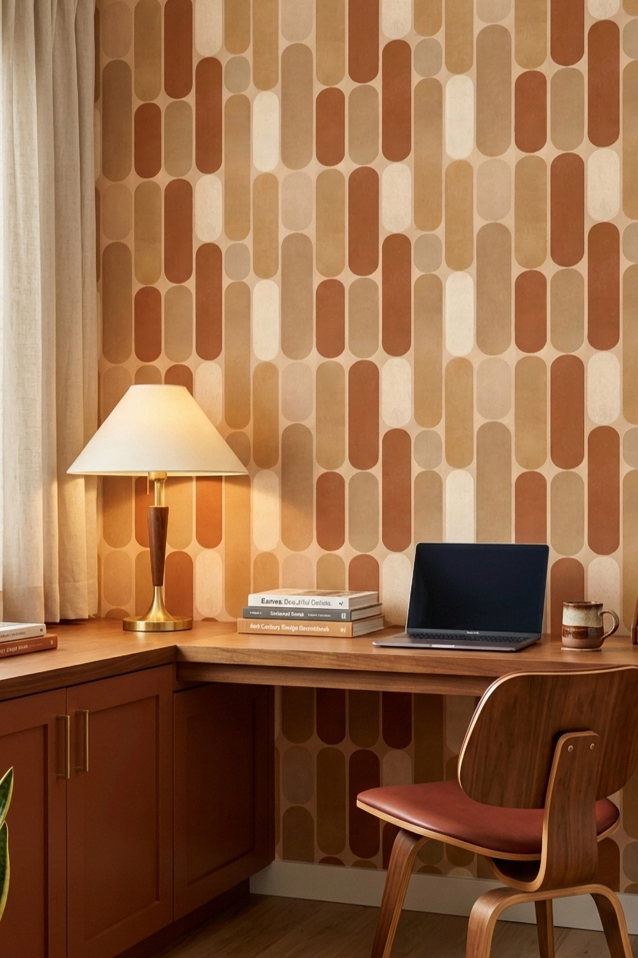 Terracotta and cream retro geometric wallpaper in a home office.