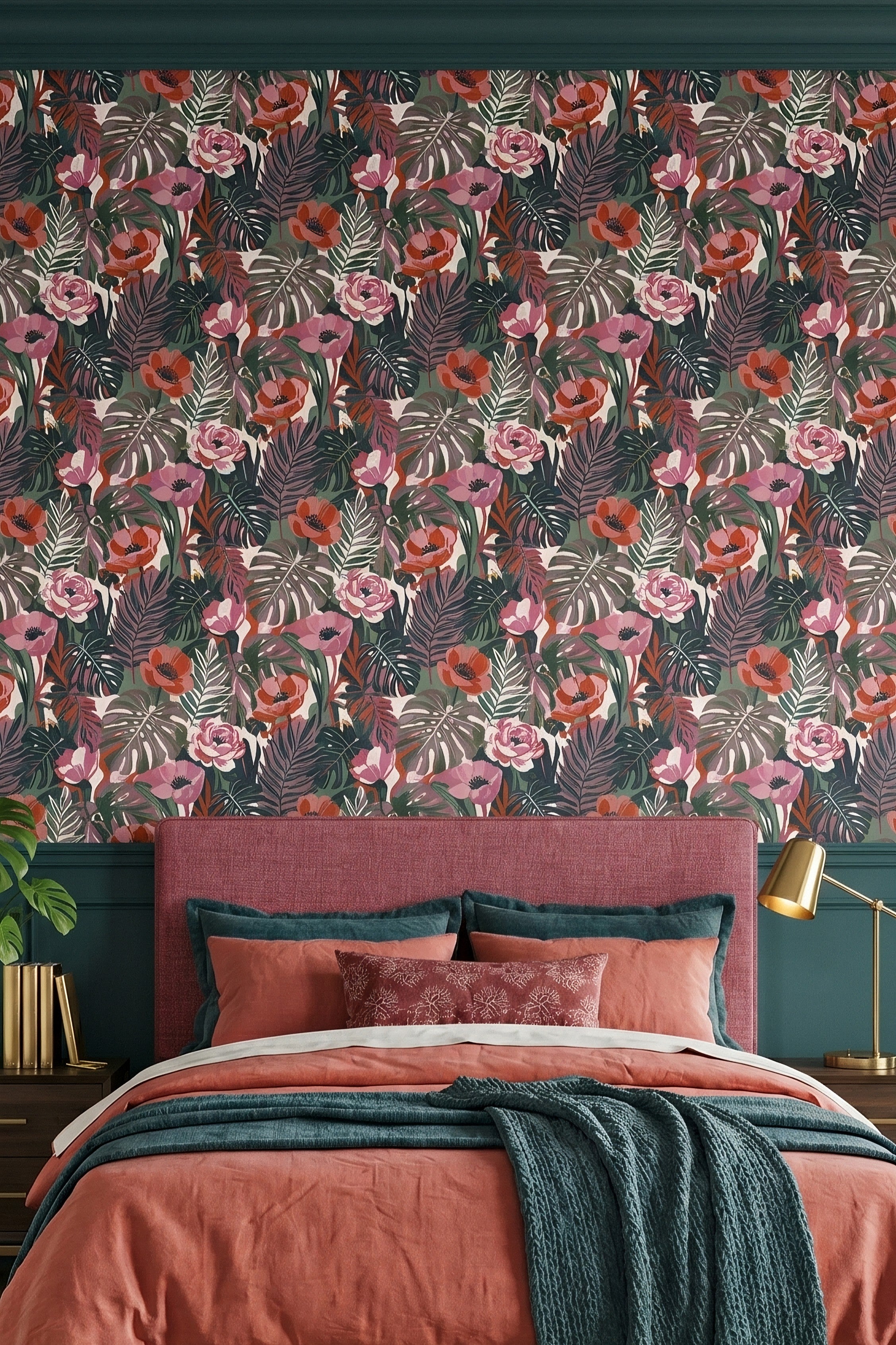 Pink and red tropical blooms on forest green wallpaper in a bedroom.