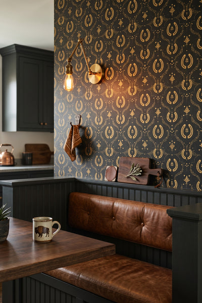 Black and gold horseshoe damask wallpaper in a cozy nook.