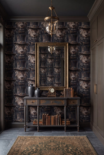Charcoal and gold leopard wallpaper in an entryway.