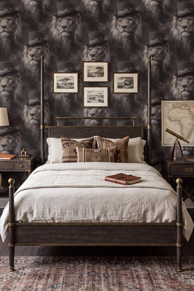 Silver gray lion in a top hat wallpaper in a bedroom.