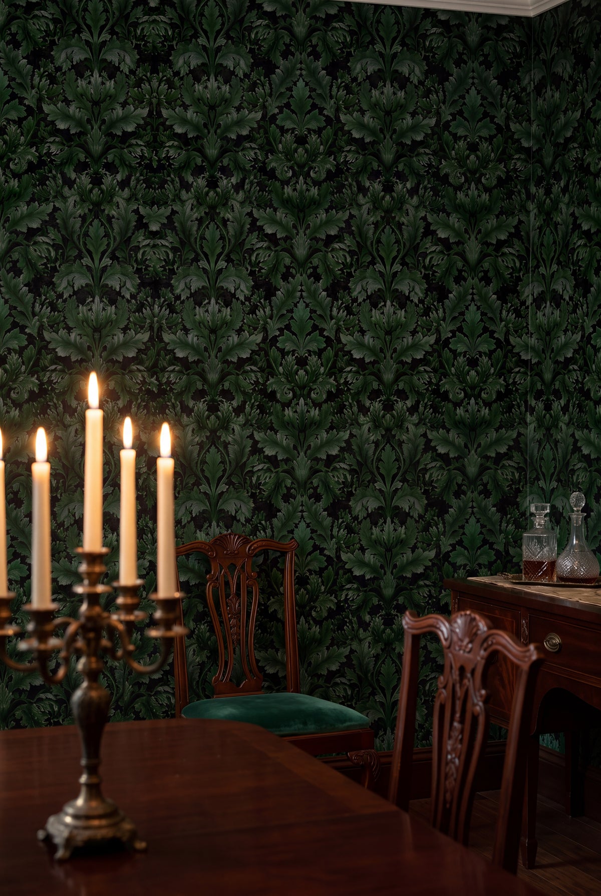 Emerald green acanthus plumes on a black Victorian damask wallpaper in a dining room.