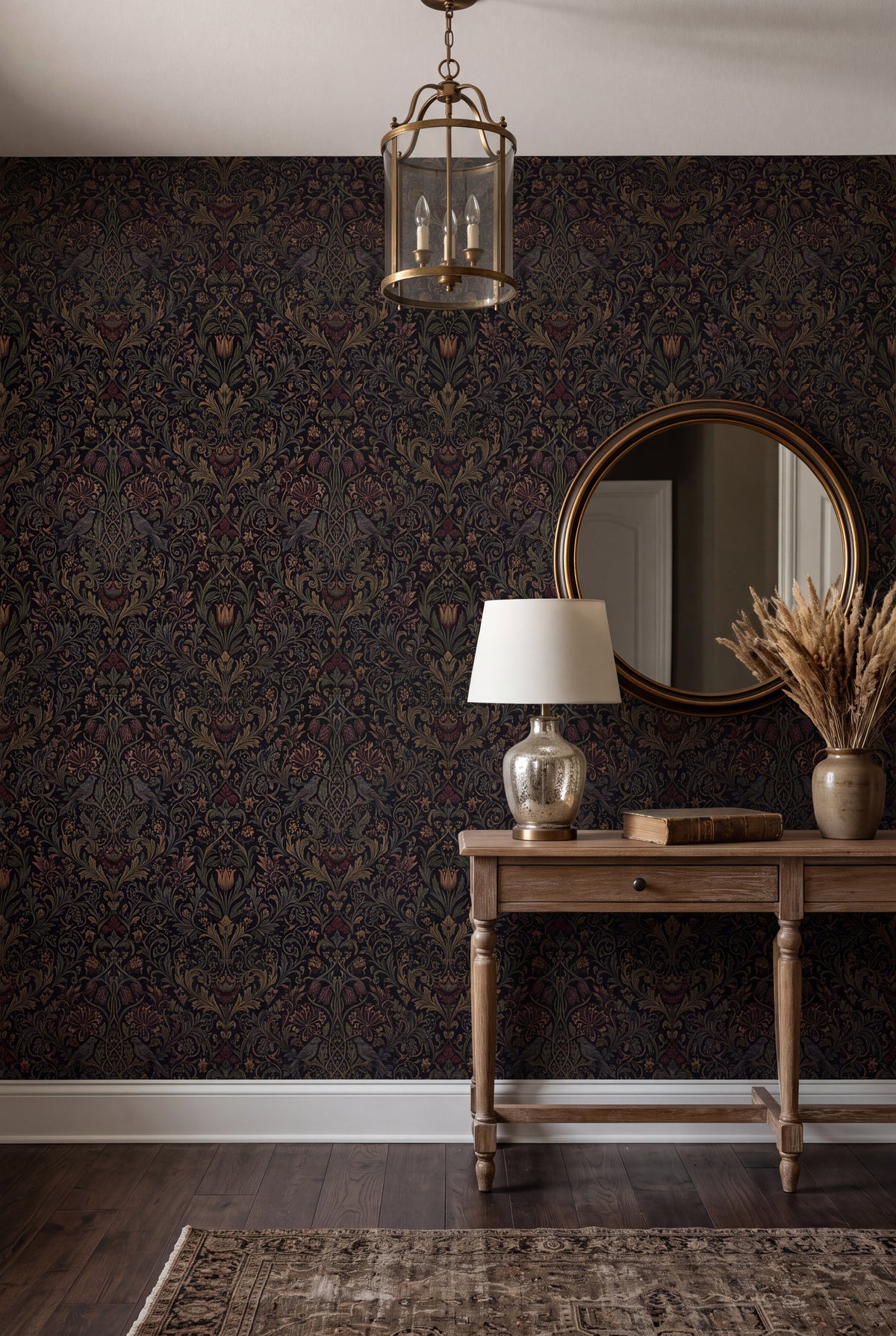 Paired songbirds and honeysuckle on a black gothic Morris wallpaper in an entryway.