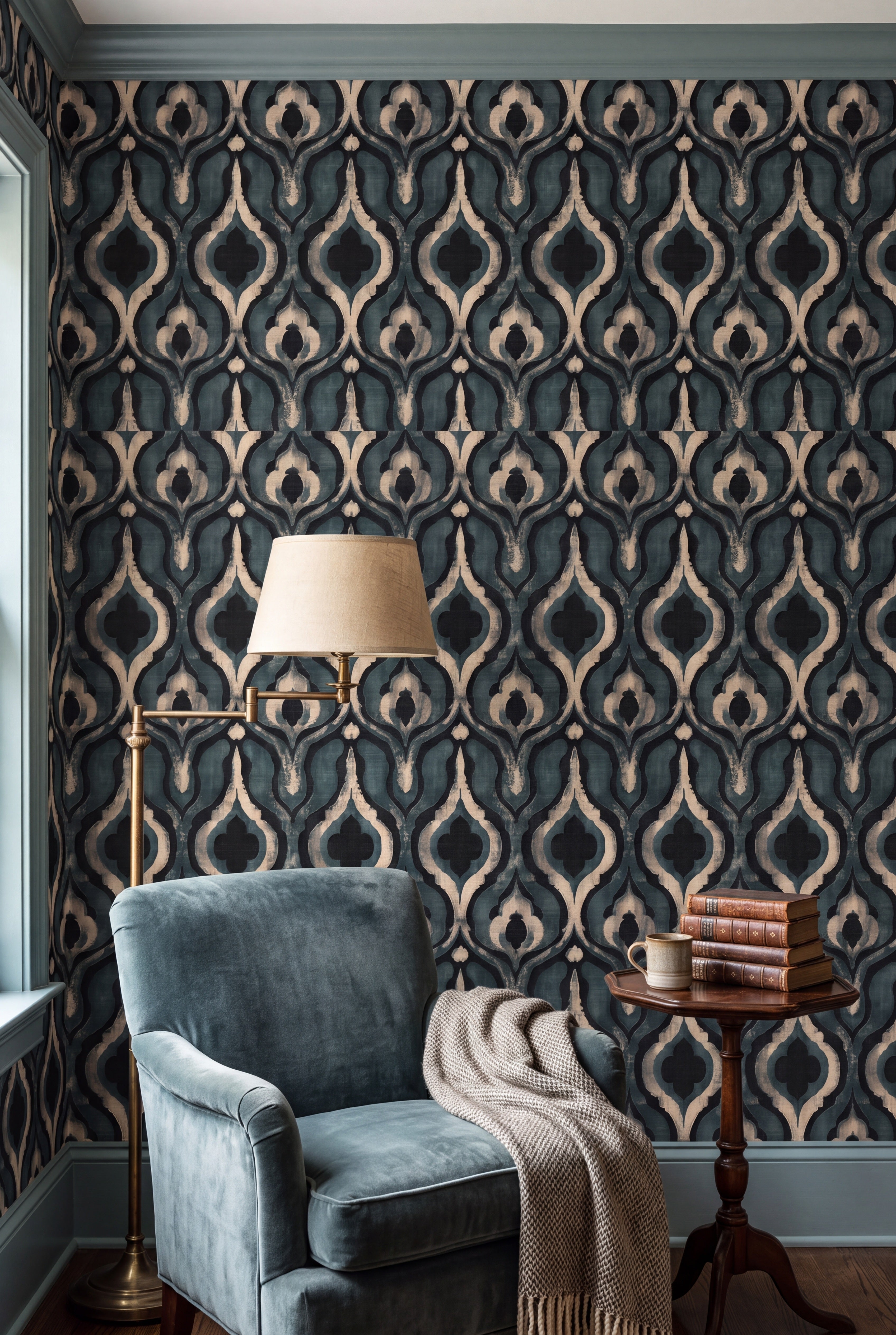 Slate teal ogee lantern damask wallpaper in a cozy reading nook.